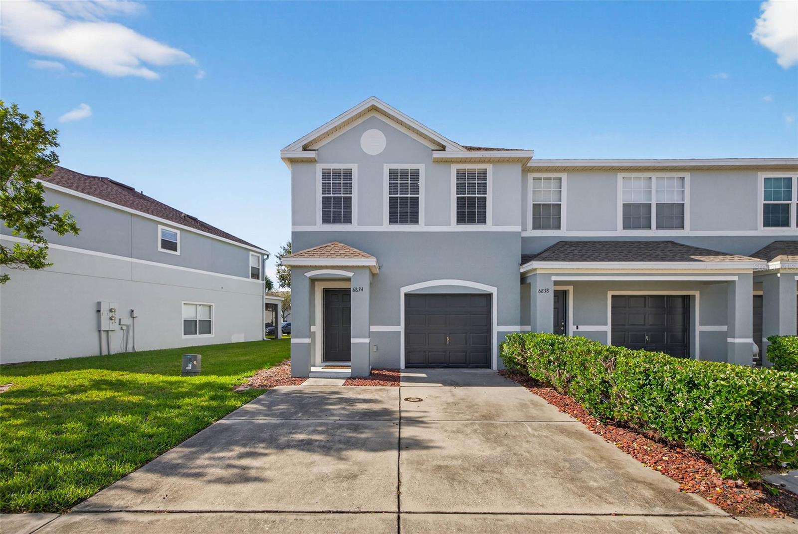 Welcome to the highly desirable community of Sawgrass Village, where you'll find green spaces, aclubhouse, a dog park, and a community pool—all with low monthly HOA fees and no flood zonedesignation. This beautifully updated 3-bedroom, 2.5-bathroom end-unit townhome features solidconcrete block construction, an attached one-car garage, and a covered, screened rear patio.Inside, the first floor boasts an inviting open-concept layout with a spacious living and dining area, ahalf bath, and an upgraded kitchen complete with new appliances (2025), granite countertops, a tilebacksplash, a pantry, and bar-top seating. Tile flooring flows throughout the main floor, while thestairs and entire second level are finished with brand new carpet (2025).Upstairs, a convenient split-bedroom layout places all three bedrooms and the laundry room on thesecond floor. The expansive primary suite includes an ensuite bathroom with dual vanities, doublemedicine cabinets, a glass-enclosed walk-in shower, a spa tub, and a large walk-in closet.Recent upgrades include: roof (2025), A/C (2024), water heater (2020), interior paint (2025), newshower fixtures, faucets, dining room chandelier, and updated exterior painting throughout thecommunity.This move-in-ready townhome offers modern finishes, solid construction, low maintenance, andunbeatable convenience—just minutes from shopping, restaurants, major highways, downtown St.Petersburg, South Tampa, the airport, and award-winning Gulf beaches. Homes like this goquickly—don’t miss your opportunity!