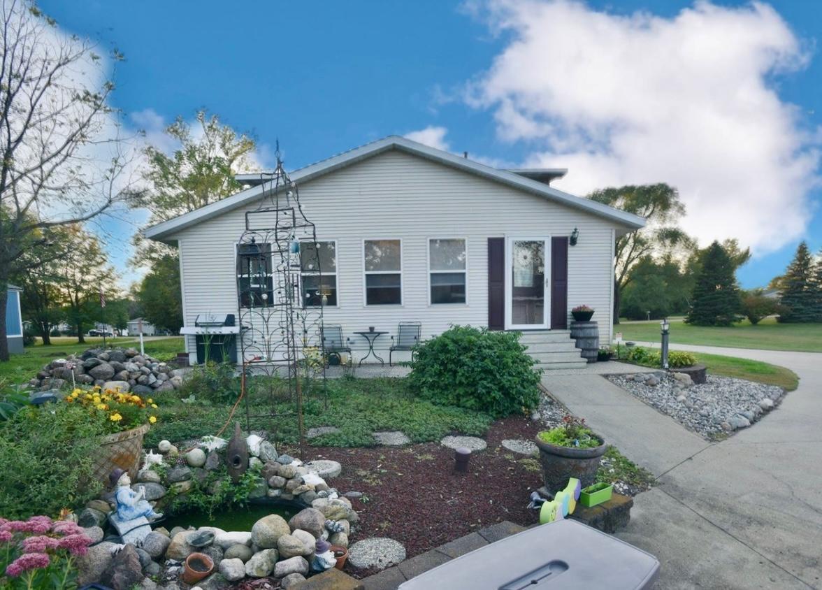 Discover the perfect blend of space, comfort, and privacy in this charming single-family home, set on over an acre at the end of a quiet, no outlet street. With 3 bedrooms and 2 bathrooms, this residence offers a warm and welcoming layout for families or anyone seeking room to grow.Step inside to a spacious family room featuring a cozy fireplace, ideal for gatherings on cool evenings. The tall ceilings in the basement provide an open feel, with a partially finished area that’s ready for your personal touch—perfect for a home gym, office, or entertainment space.Car enthusiasts and hobbyists will appreciate the 4-stall garage, one stall is insulated and heated and the impressive 40x60 pole barn, offering endless storage and workshop possibilities. Outdoor lovers will enjoy being within walking distance of two beautiful lakes, making it easy to spend weekends fishing, boating, or simply relaxing by the water.This property combines peaceful country living with the convenience of nearby amenities—truly a rare find.