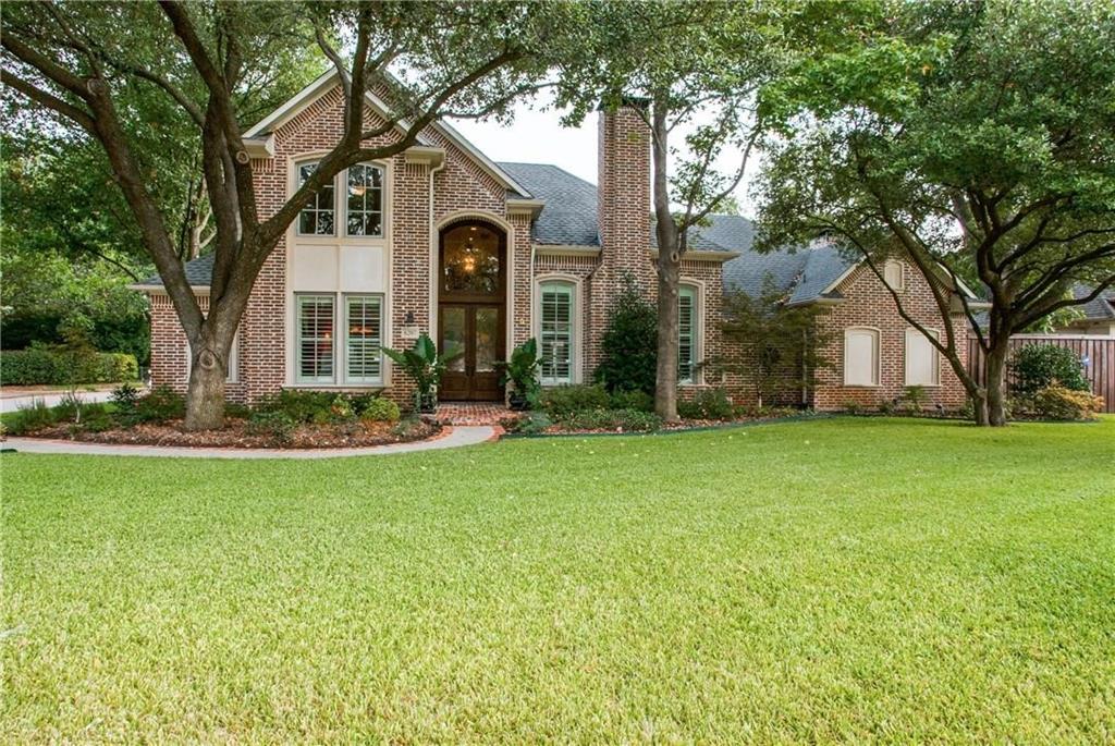 Beautifully situated in the heart of Preston Hollow, this elegant home welcomes you thru striking leaded glass front doors into a soaring entry accented w hand-scraped wood flooring & graceful wood staircase. The Chef’s Kitchen is equipped w high-end appliances including a GE induction range & built-in Jenn Air refrigerator & separate ice maker, trash compactor, warming drawer, Miele Built in Coffee system, for your own crafted coffee! This home is perfect for everyday living & entertaining. The spacious primary suite offers a cozy fireplace, spa-like bath with heated floors, a jetted tub & an incredible custom closet designed for luxury.The main living room, complete with a cast stone & marble fireplace, also features a wet bar & wine storage while overlooking the backyard retreat. Step outside to enjoy the sparkling saltwater diving pool w slide & waterfall, a built-in grill, motorized awnings, Board on Board 8ft freshly stained fence, pedestrian electric gate & plenty of space for gatherings beneath the shade of mature trees. Offering a serene escape from the hustle & bustle of the city. Perfect for hosting summertime gatherings or enjoying a quiet evening under the stars. Formal dining could be an office w a great view of the canopied trees & landscaping. The family room includes a built-in study, ideal for work or school needs, while the utility room provides ample space & storage. 2024 Roof with class 4 & leaf guard gutters with a lifetime warranty & never has to be cleaned!4 generously sized bdrms, this home is ideal for families or multi-generational living with Primary + 1 additional bedroom on 1st floor. Home sits on a large corner lot w 3 car cedar garage doors & extra parking This home is made with solid construction in a coveted Preston Hollow corridor, you’ll enjoy convenience to top restaurants, NorthPark Mall, downtown & endless shopping. This property blends timeless elegance w lifestyle appeal in one of Dallas’s most desirable neighborhoods.