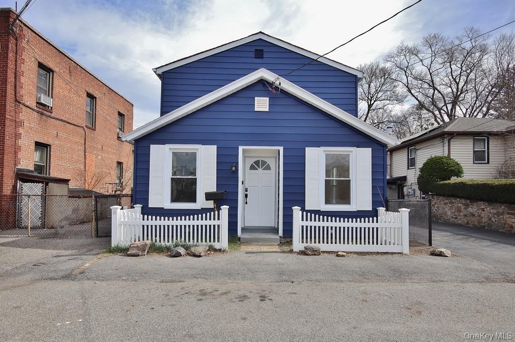 Welcome to your turn-key piece of paradise located in the exclusive Village of Mamaroneck NY! This completely renovated colonial is just minutes away from every convenience and luxury that you can desire. Whether you are looking to downsize or you are just starting out, everything has been thoughtfully done for you! Close to all, yet nestled on a quiet street, you truly get the best of both worlds. Natural light washes over you on both floors of this beautiful home. The customized first floor master bedroom and ensuite greet you on the right as you walk inside. To the left, you'll find an open floor plan that showcases the newly remodeled living room and state of the art kitchen, equipped with top of the line stainless steel appliances, including washer and dryer. Steps away are the guest powder room and dining room, which is large enough for formal or casual dining. Upstairs boasts of large closets in each light-filled bedroom, separated by a full bathroom and built-in shelving at the stairs landing. Access to the attic scuttle can be found inside of the large closet beside the stairs. Tons of storage and built-in shelves are also located in the basement, which features a walkout door, storm shelter and Bilco doors leading to the backyard. The custom deck wraps around the entire backyard and can be entered from the left or right sides. As both possibilities and comforts abound with this property, now is an excellent time to make your best offer and secure this rare find as your own.