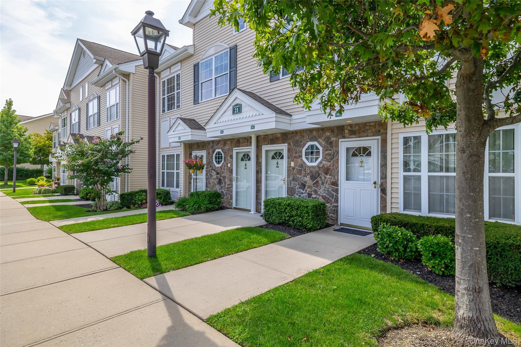 Welcome to this freshly painted and carpeted move in ready condo located in a highly desirable, active and conveniently located 55+ community. This home offers comfort, style and low maintenance living - all just minutes from shopping, dining, medical facilities and more. Enjoy cooking in the updated kitchen featuring new appliances, serve in the formal dining room and entertain in the living room or lower level. Unwind in the spacious Primary bedroom with a private ensuite or relax in the 2nd bedroom/den or office. The finished basement offers extra space perfect for guests, hobbies or a large entertainment area. With modern updates throughout and a location that puts everything with easy reach, this condo is ready for you to move in and start enjoying the good life!