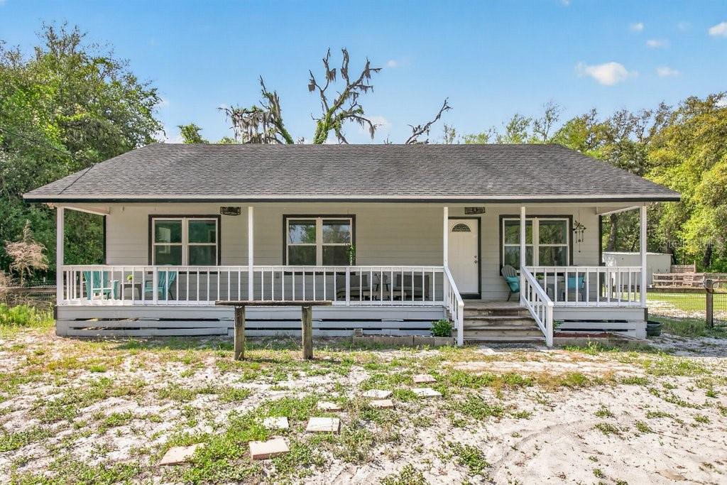 If you’ve been looking for space, privacy, and the kind of setting that’s getting harder to find, this property delivers. Tucked away on 19.38 acres, this 2 bedroom, 2 bathroom home offers an open, comfortable layout with vaulted ceilings in the main living area and a natural flow into the updated kitchen—creating a space that works well for both everyday living and gathering. A separate bonus room provides flexibility for a home office, guest space, or hobbies. The primary suite has been deliberately updated, offering a refreshed and relaxing retreat.Key features include a freshly painted exterior (2026), roof installed in 2016, and the independence of a private well and septic system.Outside, the property is where this home truly stands apart. With no neighbors in sight, you’ll enjoy a level of privacy that’s increasingly hard to find. The acreage is dotted with beautiful oak trees, cross-fenced, and includes multiple outbuildings—offering endless possibilities for use. There’s space to garden, ride horses along your own trails, build tree forts, or enjoy ATVs, all with the freedom of no HOA restrictions. The property also offers established areas for hunting and recreation.Conveniently located approximately 20 minutes to Palatka, about 45 minutes to Gainesville, and just 1 hour to the beautiful beaches of St. Augustine. Etoniah Creek State Forest is just about 15 minutes away for additional riding trails, hiking, and outdoor exploration.This is a rare opportunity to own a property where privacy, functionality, and lifestyle come together.