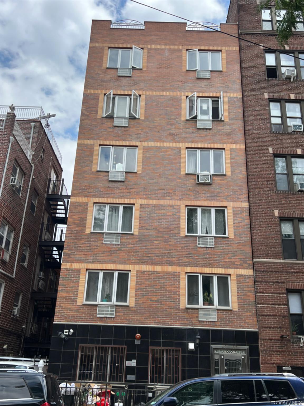 Welcome to this bright and well-maintained elevator condo located in the heart of Sunnyside. Built in 2009, the building offers a comfortable residential setting with only two units per floor. Situated on the 5th floor, this unit features a spacious living room filled with natural sunlight, creating a warm and inviting living space. The home includes a practical layout, gas stand-alone water heater, wall/window cooling, natural gas baseboard heating, and public water/sewer utilities. Enjoy the convenience of being near public transportation, schools, shops, restaurants, and everyday neighborhood amenities. Bus service is nearby, and the 7 train is only a few minutes away, offering easy access throughout Queens and Manhattan. Monthly common charge is $295 and annual taxes are reported at $3,675 for tax year 2025. Excellent opportunity for buyers seeking a convenient Sunnyside location with elevator access and strong neighborhood appeal.