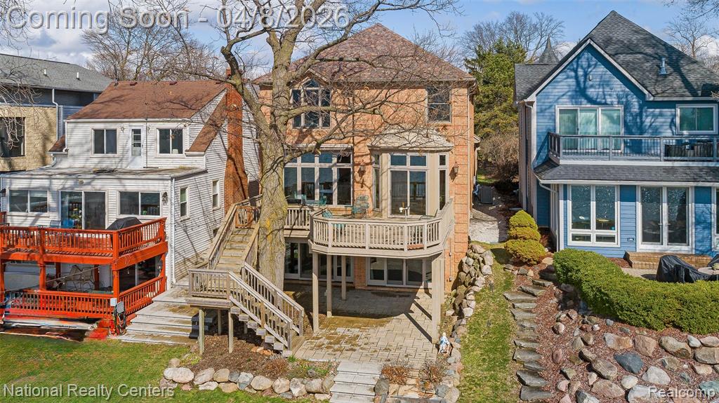 SPECTACULAR LAKE-FRONT HOME, IN A PRIME LOCATION DIRECTLY ON DESIRABLE ALL-SPORTS WALLED LAKE!! This stunning all brick spacious lakefront home offers the perfect blend of space, comfort, & sunset views from almost every room! With 4 bedrooms and 4 1/2 bathrooms across 3,850 finished square feet, this home is designed for both everyday living & entertaining. Impressive two-story foyer opens into a gorgeous great room, with high ceilings, crown molding, a fireplace for cool evenings & an entire wall of windows for natural light & million dollar views of the lake. The great room opens into a large dining area, with a door wall to the huge deck for outdoor entertaining, BBQ & relaxation. The tremendous kitchen is a true centerpiece, featuring SS appliances, a built-in refrigerator, double oven, cooktop, two sinks & abundant cabinet/counter space. The main level also features rich wood flooring, a convenient 1st-floor laundry room, with sink& plenty of cabinets/closets.  Upstairs, the primary suite is a true retreat with vaulted tray ceiling, fireplace, dbl closets, & breathtaking water views. Primary bathroom, with soaking tub, & walk-in shower. Additional 3 bedrooms are generously sized, and include a jack-and-jill bathroom, as well as a 3rd full bath on the second flr. A finished walk-out basement expands your living & recreational space with a large  family room, fireplace, rec area, wet bar/sink/fridge, & warm wood accents, and walks out to a huge brick paver patio. Take full advantage of lake front living, with swimming, fishing, kayaking, boating, on an all-sports lake!  Multiple outdoor spaces - with decks & patios, offering endless opportunities to relax & enjoy lakefront living. 2-car attached garage. NEWER Roof, Furnace, AC.  Prime lakefront location, near beaches, parks, trails, shopping, restaurants, with highly awarded Walled Lake Schools. Enjoy lakefront living at its finest, & a rare opportunity to have your own paradise directly on Walled Lake!