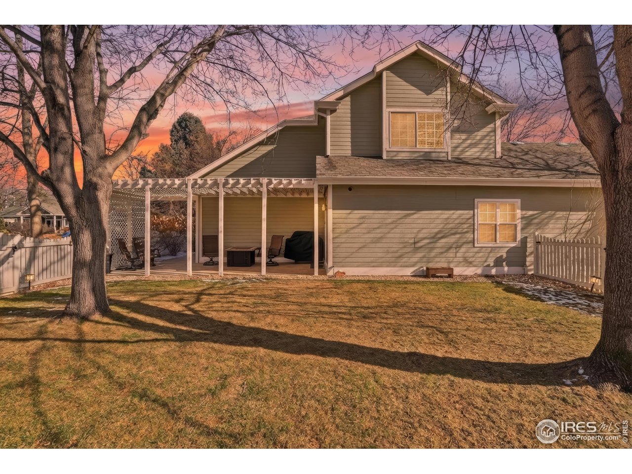 Welcome to 1920 Simsbury Court, nestled in one of North Fort Collins' most cherished neighborhoods. Set on a peaceful corner lot surrounded by mature trees and backing to a greenbelt, this spacious home offers 4 bedrooms, 4 bathrooms, and 3,933 square feet of comfortable, well-designed living space. Step outside to a backyard designed for relaxing and gathering, featuring a pergola beneath a canopy of trees and charming picket fencing with three gates that open directly to the greenbelt. It's the perfect setting for morning coffee, evening conversations, and enjoying the quiet beauty of nature just beyond your fence. Inside, the living room welcomes you with a cozy gas fireplace and expansive windows that fill the space with natural light. The kitchen complete with a gas range, center island, breakfast bar, nook, and dining area flows effortlessly for everyday living and easy entertaining. The main-floor primary suite offers comfort and privacy, highlighted by a newly updated bath with quartz countertops, new LVP flooring and a dual-entry walk-in closet. Upstairs, two generously sized bedrooms and a full bath provide space for family or guests. The finished basement adds even more room to spread out, featuring a rec room, family room, gas fireplace, pool table, bath, and a fourth nonconforming bedroom-ideal for gatherings, hobbies, or overnight visitors. An oversized south-facing three-car tandem garage offers plenty of storage and convenience. With abundant wildlife, quick access to I-25 via Mountain Vista, and just minutes to Old Town Fort Collins, this home offers both tranquility and accessibility. No metro district, adding lasting value.