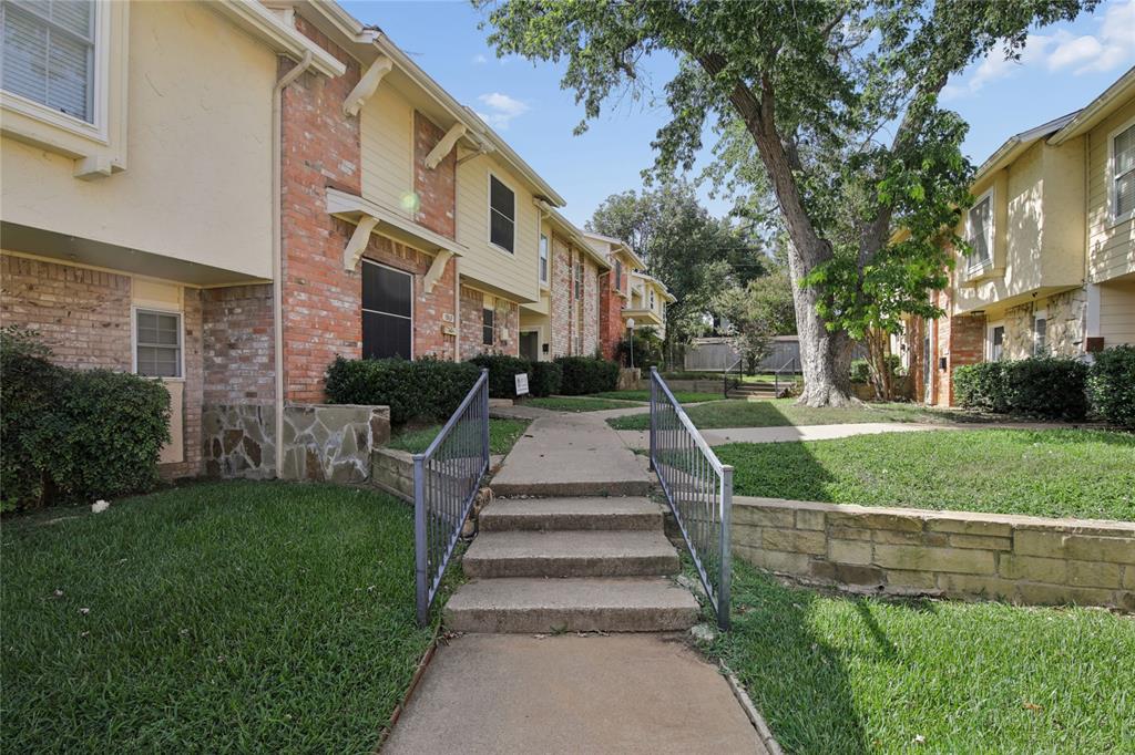 Opportunity is Knocking! Whether you're searching for your first home, a low-maintenance lifestyle, or a smart investment, this beautifully updated condo offers exceptional value in one of Grapevine's most desirable locations.  Imagine stepping outside your front door and strolling to the scenic Grapevine Horseshoe Trails, or spending your weekends at Dove Waterpark, the pickleball and tennis courts, or Dove Park Playground—all just a short walk away.  Inside, you'll find a move-in ready home filled with natural light, featuring brand-new carpet in every bedroom and fresh interior paint throughout. The living room centers around a cozy wood-burning fireplace, while the charming enclosed patio provides the perfect space for grilling, relaxing, or enjoying your morning coffee. The kitchen includes a stainless steel refrigerator that will convey with the property.  Additional highlights include a full-size two-car garage and two recently replaced HVAC systems, offering both convenience and peace of mind.  The HOA makes everyday living easy by maintaining the front landscaping and providing access to a community pool, clubhouse, and outdoor grilling area.  Finding a move-in ready home in Grapevine under $300,000 is becoming increasingly rare. Don't miss this outstanding opportunity to own a home that combines location, value, and lifestyle in one exceptional package.
