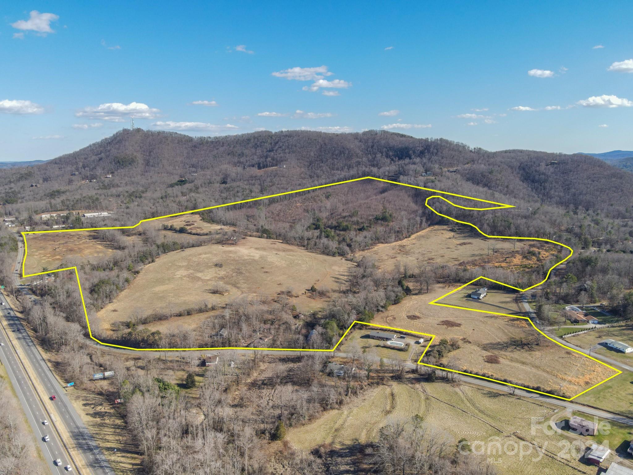 Fantastic location near I-40 with approximately 165 acres. Property borders High Peak Mountain Road and Drexel Road with beautiful views and two creeks on the property. Conveniently located about 15 minutes from Morganton, 20 minutes from Hickory, an hour from Asheville, and slightly over an hour to Charlotte. Service road frontage centered between I-40 Exits 106 and 107. Don’t miss this opportunity!