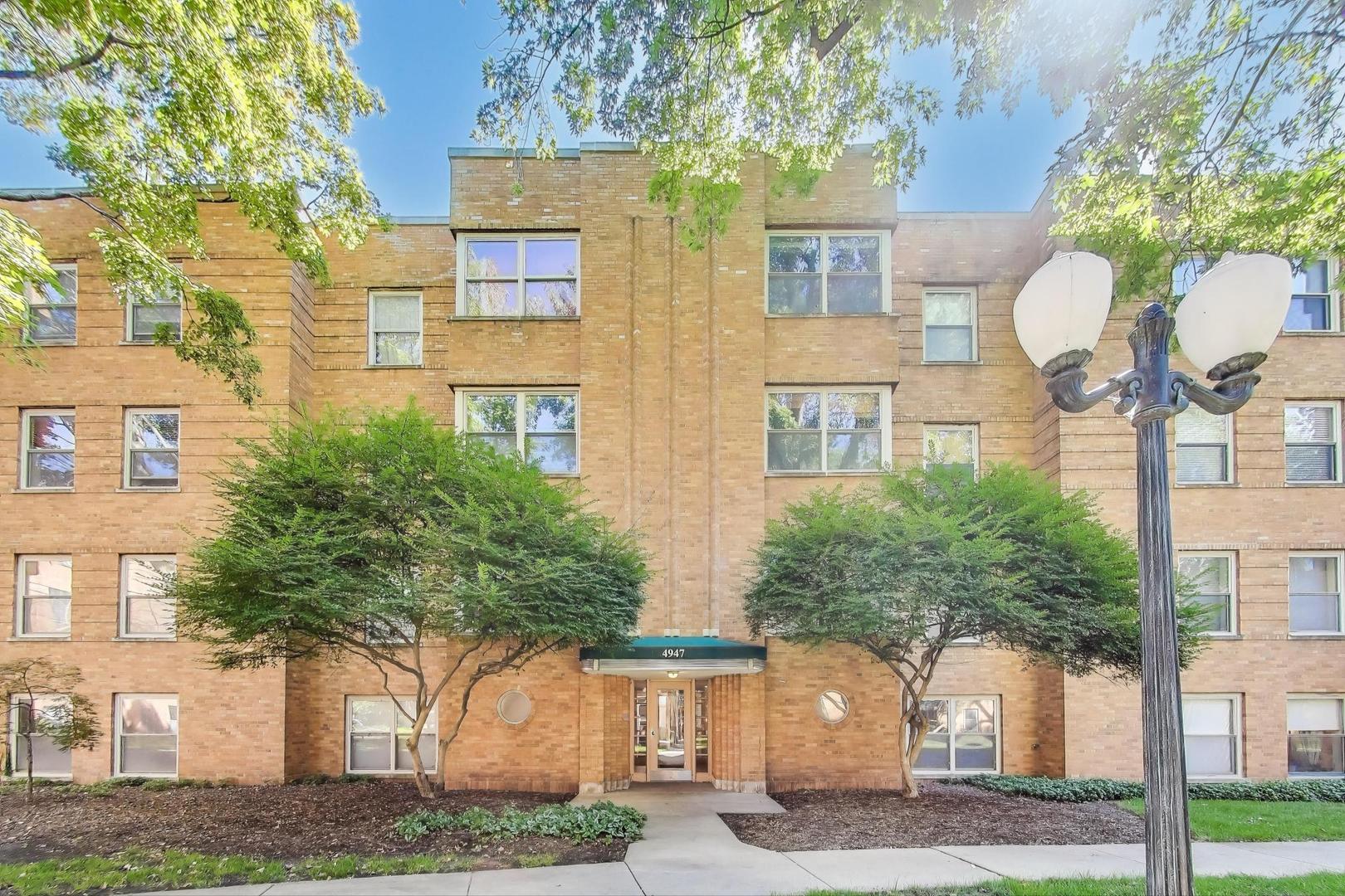 Welcome to this exceptional one-bedroom residence, perfectly designed for comfort and style. Perched on a high first floor and set back from the street, it offers a serene, park-like setting that feels worlds away from the city.  Step inside to discover a spacious layout filled with character - graceful archways, rich hardwood floors, and thoughtful architectural details throughout. The inviting living room centers around a cozy gas fireplace, while a separate dining area provides the ideal space for entertaining.  The newly renovated kitchen is a true highlight, featuring generous space, sleek stainless steel appliances, and contemporary finishes. The luxurious, spa-inspired bathroom adds another touch of sophistication, designed for ultimate relaxation.  Modern comfort is ensured with central air and an in-unit washer and dryer. Conveniently located near the Brown Line, Metra, boutique shops, and acclaimed restaurants, this home blends tranquility with easy access to all the best the neighborhood has to offer.