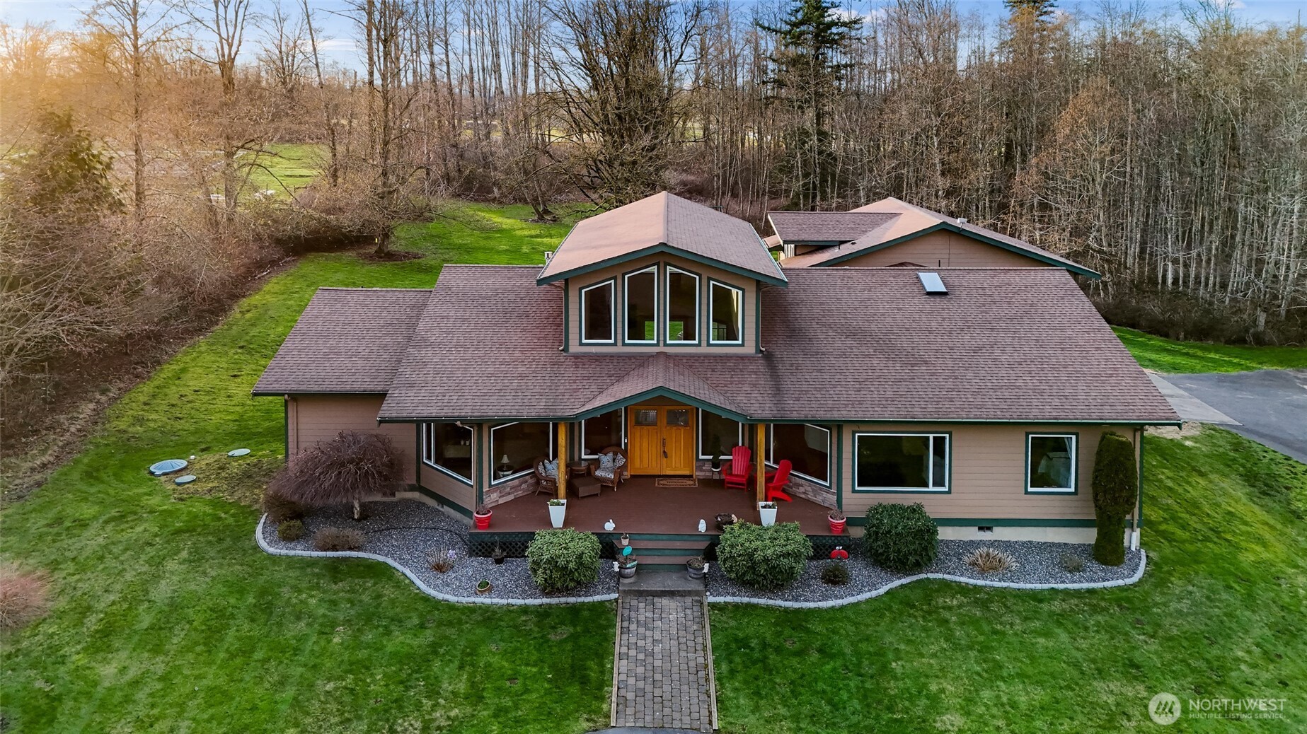 Own stunning views of Mt Baker from every corner of this custom single floor living, gorgeous custom home, nestled within a gated 5 acre park like setting, complete with invisible dog fence and Lifetime playground. Exceptional value in every detail including the spa like primary suite, 9'-24' cathedral ceilings, French doors, custom alder kitchen cabinets ,double convection oven, and walk-in pantry, wet bar, expansive bonus room and more. Recently added is a spacious laundry mud room and a 448 sq ft, fully independent and permitted suite with full kitchen, laundry, and separate heat pump. The 40’ by 60’ three bay insulated shop is equipped with radiant heat, full power and car lift. Simply too much to list! This is a must see!