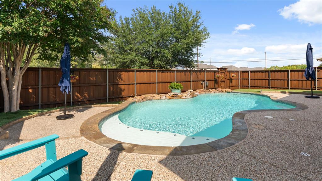 Impressive one-owner, 4 Bed, 4 Bath home built by K.Hovnanian, offering turn-key luxury in the highly rated Allen ISD. This property is defined by premium updates, energy efficiency, and an exceptional outdoor oasis.Meticulously maintained, the entire residence has been refreshed with new interior paint,  features solid wood plank flooring throughout the main living areas and new carpet in the bedrooms. Architectural details shine with five striking contemporary chandeliers and four new ceiling fans.The gourmet kitchen is a chef's dream, featuring a quartz-topped powered island and strategically placed illuminating electrical outlets. The primary ensuite is a tranquil retreat, showcasing new solid-surface countertops, a modern frameless shower, and updated fixtures. Even the hall bath has been renovated with new flooring, sink, lighting, mirror, and hardware.Functional efficiency is guaranteed by a newly installed 18 SEER 2-stage HVAC system, promising superior comfort and significantly lower cooling bills. Flexible living spaces include a dedicated home office and a versatile upstairs game room ready to function as a fitness zone, play area, or creative studio.The backyard is a private oasis.  Step out to your sparkling salt-water pool, covered patio (plumbed for gas), and low-maintenance turf. Best of all, a private gate provides direct access to a quiet greenbelt and walking trail, ensuring unmatched privacy with NO BACK NEIGHBORS. Enjoy community amenities including parks, a community pool, and a catch-and-release fishing pond.This is a rare opportunity to own a fully updated home that combines luxury, efficiency, and a prime McKinney location.  Conveniently located near schools, shopping and entertainment, with quick access to both the 75 & 121 freeways.