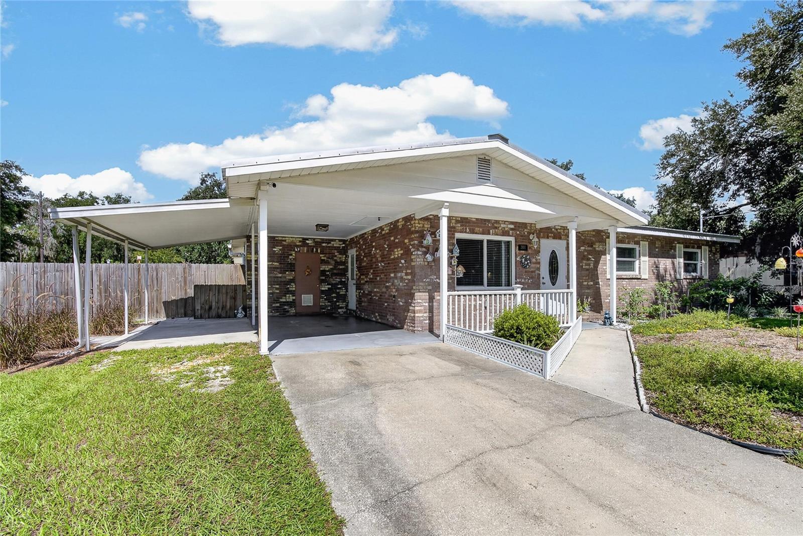 Under contract-accepting backup offers. Discover the charm of this vintage Plant City ranch home where thoughtful remodeling blends beautifully with the character of an older home. Situated on an expansive .40-acre lot with NO HOA and NO deed restrictions, this property offers plenty of room for RVs, boats, trailers and more. The fully fenced backyard is a true retreat, featuring a private pool, charming Florida native plants, two storage sheds and a spacious rear lanai. The lanai includes built-in storage and overlooks the beautifully landscaped backyard, creating a wonderful space for relaxing or entertaining. Inside, the home has been lovingly remodeled while preserving its original charm and character. The spacious owner’s suite includes a private bathroom and direct access to the rear lanai. One secondary bedroom offers built-in storage, while the oversized family room is a true gathering space with a decorative fireplace, built-ins and an abundance of windows providing wonderful natural light. The kitchen features new appliances, and the home offers updated windows installed in 2024, including several hurricane-rated windows. Conveniently located near shopping, dining and major highways, this unique property combines vintage appeal, modern updates, outdoor living and the freedom of a spacious lot with no HOA or deed restrictions. A rare opportunity for buyers seeking space, flexibility and character in a convenient Plant City location!