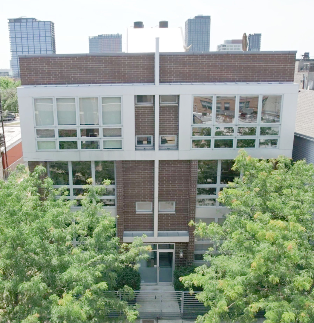Welcome to this sun-drenched jumbo three bedroom, two bathroom West Town oasis nestled perfectly in the middle of the city's best neighborhoods! Upon entering, you will be greeted by the versatile, open floor plan. The home's features include: floor-to-ceiling windows; hardwood floors in all bedrooms and throughout living areas; great ceiling height; central heat & air; in-unit ceiling fans; generous room sizes throughout; a new, tech-savvy "just load and go" washer/dryer; and a large private deck. Chef's gourmet eat-in kitchen offers white cabinets, quartz countertops, high-end designer Fisher and Paykel appliances, plus an additional beverage refrigerator. The cozy fireplace accentuates the inviting living room, adjacent to the separate dining space, flowing seamlessly into the spectacular kitchen. The primary bedroom boasts room for a king-sized bed, a walk-in closet with custom shelving - and a luxurious en-suite bathroom featuring radiant heated floors, double vanity sink, whirlpool tub and separate shower with body sprays and rainforest shower head. This home is truly flooded with light! Unit owners share the common garage rooftop deck. Numerous conveniences just out your door: shops, restaurants, nightlife, parks and transportation options abound, along with everything else this vibrant area has to offer. Just minutes from West Loop / Fulton Market / River West / River North. All brick/masonry building resting on an extra-long 150' deep lot. All this, plus GARAGE PARKING and ENORMOUS ADDITIONAL 15x9x6 STORAGE space included in price! Unbeatable!
