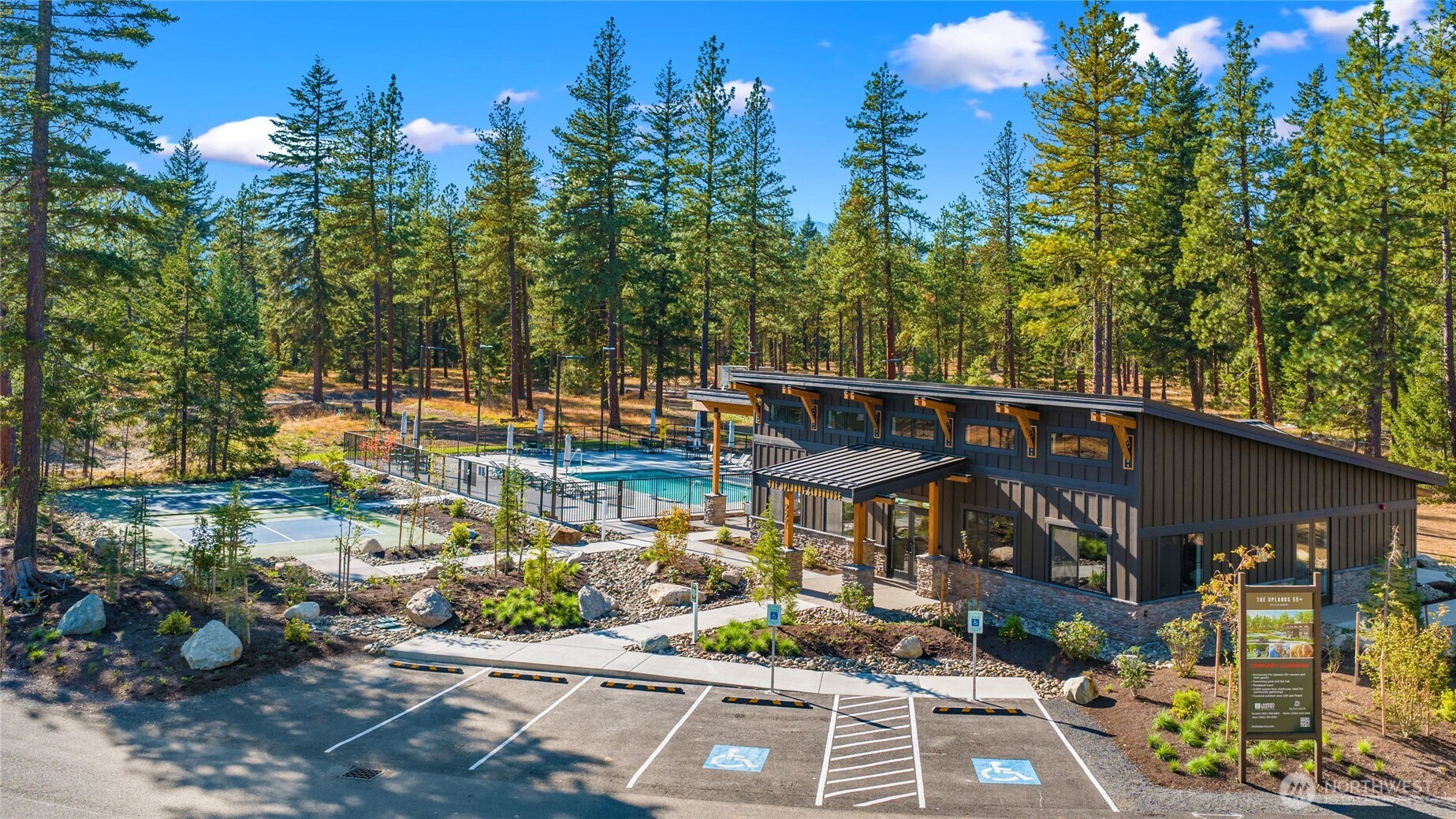 The Uplands Clubhouse with pool, hot tub, and pickleball court.