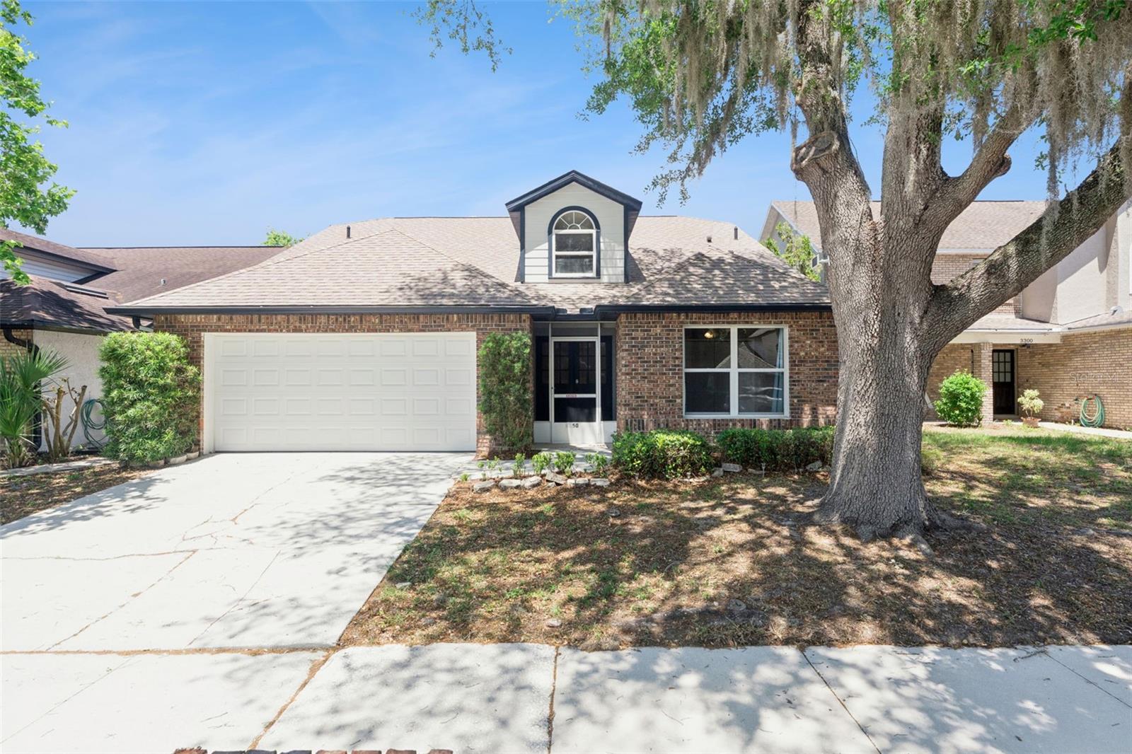 Welcome home to this charming and well-maintained 3-bedroom, 2-bath residence nestled in a highly desirable neighborhood on a quiet street. From the moment you arrive, you’ll appreciate the inviting curb appeal and the cozy screened-in front entry. Step inside to a bright and airy living space featuring soaring vaulted ceilings and beautiful skylights that fill the large living room with natural light. A dedicated dining room offers plenty of room for seating with another large, bright window. The thoughtfully designed split floor plan offers both privacy and functionality, with the spacious primary suite tucked away from the secondary bedrooms. The primary ensuite includes a relaxing soaking tub, separate walk-in shower, double vanities and a generous walk-in closet. Two more spacious bedrooms are separated by a convenient guest bathroom with its own tub and shower. The home boasts a comfortable eat-in kitchen ideal for casual meals including plenty of white Shaker style cabinets for storage and a separate pantry. Also there's an added flex space that can serve as a home office, playroom, or sitting area—leading out to a fully fenced backyard, perfect for entertaining, pets, or simply unwinding outdoors. Additional highlights include an inside laundry room for convenience, an over-sized two-car garage, and a new roof installed in 2023 for peace of mind. This home offers the perfect blend of comfort, functionality, and location—don’t miss the opportunity to make it yours. Schedule your private showing today!