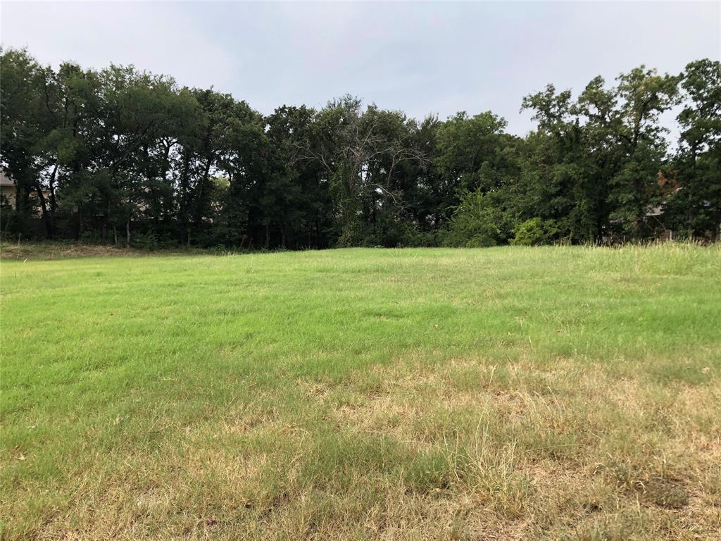 Large lot in North Bedford nearby the Rustic woods community.  Build a custom home or maybe change to commercial.  255 feet front roadside. It's a rare opportunity to get a large lot.   Walk to the Burger joint, church, drug store, donut shop, and more.  Homes on tiny lots being built nearby and starting in the 600's.  Come build a large home with a .722 acre lot.