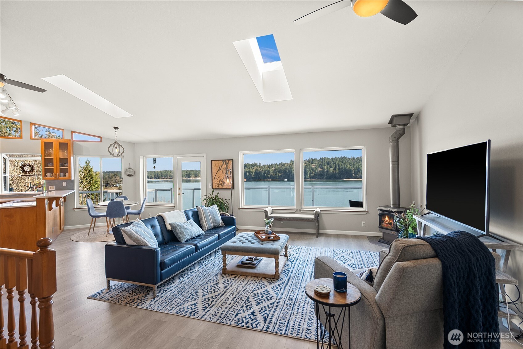 Improved price! Experience waterfront living on Pickering Passage, with sweeping views of Squaxin and Harstine Islands from this beautifully updated low bank South Puget Sound home. Watch seals and orcas swim by, kayak from your own shoreline, and gather clams on your private beach. This well maintained retreat offers 2 bedrooms, 2.5 baths, and large flex rooms, providing abundant space for guests, hobbies, work, or play. Recent updates include new flooring throughout, quartz countertops, a tile kitchen backsplash, newer appliances, fresh interior paint, and updated lighting and plumbing fixtures. Expansive picture windows, vaulted ceilings, and skylights fill the home with natural light and frame the stunning water views. Set on nearly three quarters of an acre, the property features a spacious entertaining deck, newly added landscaping, a fire pit, and plenty of lawn for gatherings. Enjoy front row views of marine life, ever changing tides, and sunsets. Conveniently located 15 minutes to Allyn, 20 minutes to Shelton, 40 minutes to Olympia, and under two hours from Seattle. You’ll enjoy both peaceful seclusion and accessible amenities with nearby restaurants, a market, bakery, and coffee shop. Discover the best of South Puget Sound waterfront living. Welcome home!