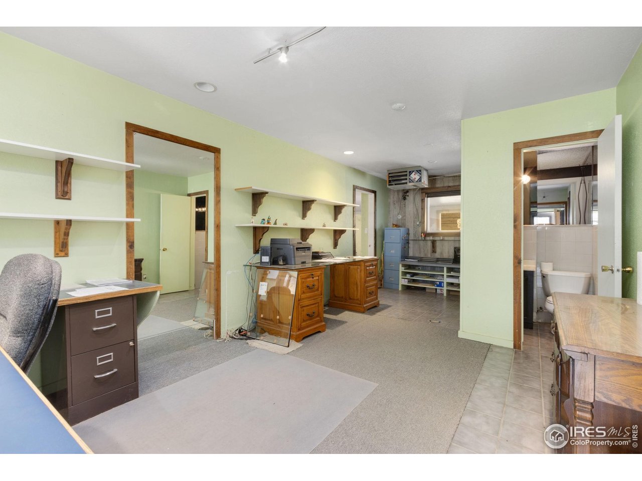Rare opportunity to own this beautifully renovated 3 Bed/2 Bath home on over a 1/2 acre w/ separate 2000 sq. ft. rec room, workshop & office space, plus oversized 2-car garage & carport. Interior features open floor plan, Brazilian pecan hardwood floors, completely updated kitchen w/ new appliances, Castorena granite countertops, breakfast bar, soft close cupboards, new large window & walk-in pantry w/ motion sensor lighting. Barn door opens to bedrooms, primary bed & bath fully remodeled w/ extra large tile flooring, new trim, porcelain walls & vanity, huge glass shower, clawfoot tub, LED mirror lighting & bluetooth connection, not to mention spacious walk in closet w/ built in shelving & motion sensor lighting. Enjoy your coffee on the Trex deck in front, or a nice lunch on the privacy patio in back w/ views of the foothills. Sizeable back yard features lovely rock garden, basketball court, chicken coop & plenty of room for gardening. Completely updated electrical, brand new installed security cameras, new paint in living room & kitchen, new siding on shop, and newly poured cement walkway leading from patio to driveway area. NO HOA!