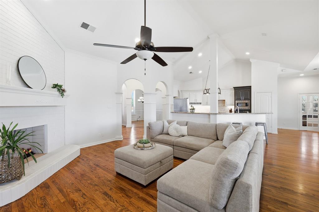 Welcome to 5809 N Ballantrae Drive in the prestigious Highland Meadows community, where elegance meets everyday comfort. Step inside and you’re greeted by soaring ceilings, rich hardwood floors, fresh neutral paint, and natural light. The thoughtfully designed single-story layout offers an open floorplan. The kitchen has granite countertops, an island and flows seamlessly into the family room with an idyllic wood-burning fireplace. Separate formal dining room has wainscoting and is perfect for everyday or holiday meals. The dedicated office or secondary living space is ideal for working from home or relaxing with family. The spacious primary suite is a true retreat, complete with a sitting area for reading and a spa-inspired bath featuring a classic claw-foot soaking tub, an oversized walk-in shower and closet. Two secondary bedrooms share a Jack-and-Jill bath, while an additional bedroom with its own en suite bath provides an ideal space for guests or multi-generational living. Outside, the home is just as impressive. Situated on a lush corner lot with a gated driveway and three-car garage, it offers exceptional curb appeal. The backyard is designed for entertaining and unwinding alike; featuring a sparkling pool and spa, mature landscaping, and a covered patio perfect for grilling, gathering, and hosting pool parties on warm Texas evenings. With solar panels and a well for landscaping water, you’ll enjoy impressive energy efficiency and utility bills that are much lower than your neighbors. Located in the highly acclaimed Grapevine-Colleyville Independent School District, minutes from major highways and Dallas-Fort Worth International Airport, and just a short drive to premier shopping and dining at Southlake Town Square, Historic Downtown Grapevine and Grapevine Lake for hiking and biking. This home offers not just luxury, but an exceptional lifestyle. Come experience the best of Ballantrae and make this remarkable home your own.