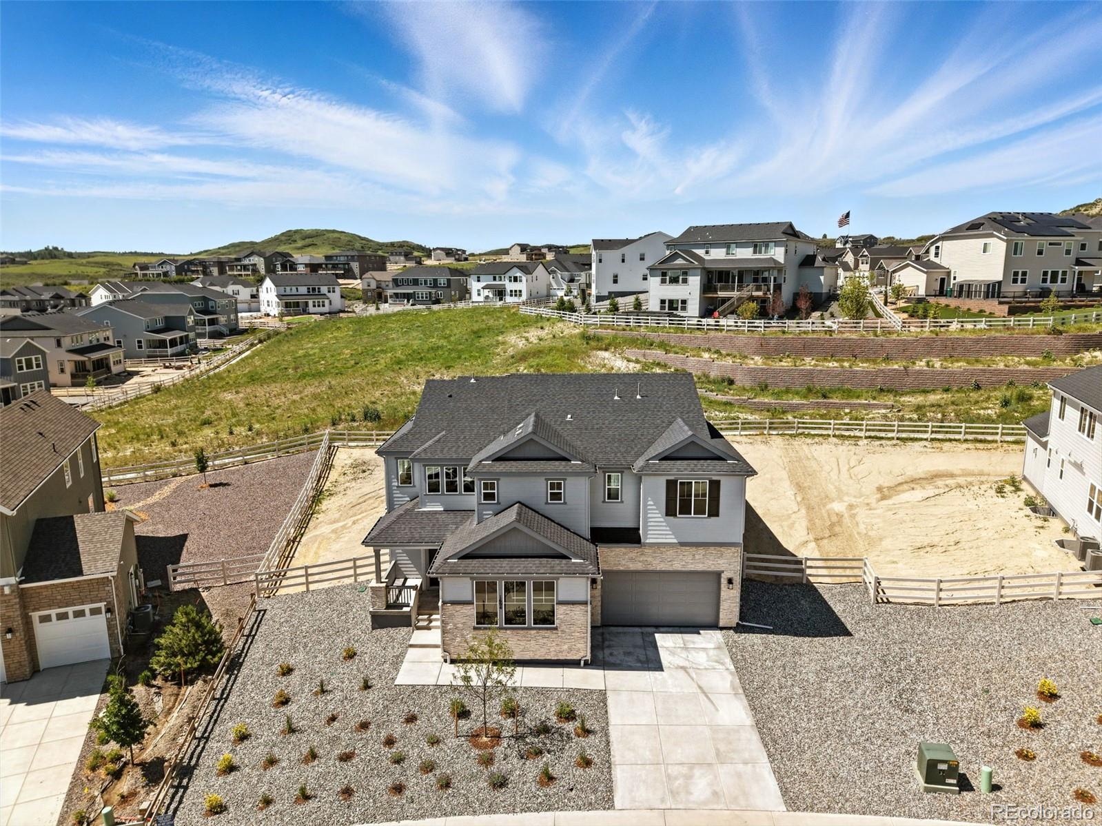 New Construction - Ready Now! Built by America's Most Trusted Homebuilder. Welcome to Keystone II at 1694 Fox Trotter Point in Crystal Valley.  Ideally located just 40 miles from both Colorado Springs and Denver, and only 5 miles from I-25, this community offers oversized lots with added space between homes—many backing to preserved open space for enhanced privacy. Students attend top-rated Douglas County Schools, known for high graduation rates and strong test scores. With a low tax rate, you'll enjoy lower taxes than many nearby new construction communities. Resort-style amenities include the Pinnacle Recreation Center with a fitness center, pool, spa, dog park, amphitheater, play fields, and miles of trails. The Keystone II offers open-concept living with a grand great room, gourmet kitchen, study, optional fourth bedroom, loft, and luxurious primary suite. An unfinished basement provides room to grow. Additional highlights added: fireplace, large walk in shower with dual shower heads and built-in seat with separate free-standing soaking tub in primary bath, extended covered outdoor living, glass doors at study and full unfinished basement.  Photos are for representative purposes only. MLS#4392201