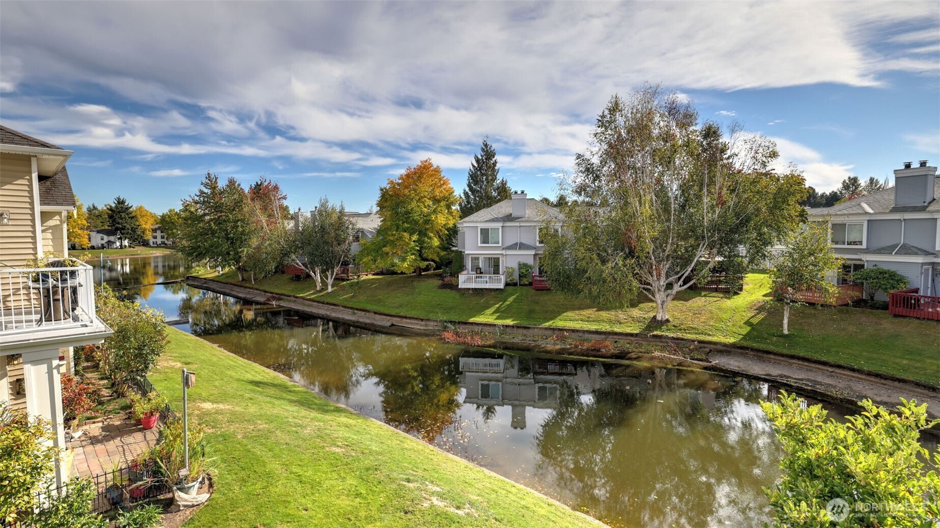 Experience serene living in the West Bay at The Lakes community. This beautifully updated condo offers peaceful canal views that bring a sense of calm and connection to nature right from your private balcony. Inside, the home combines comfort and style with a bright, open layout ideal for both relaxing and entertaining. Enjoy year-round comfort as the only unit in the community equipped with air conditioning, featuring two premium mini split systems for efficient climate control. The kitchen and living spaces flow seamlessly, creating a welcoming atmosphere enhanced by natural light and tranquil surroundings. Perfectly positioned near walking trails, parks, and convenient commuter routes, this home offers both retreat and accessibility.