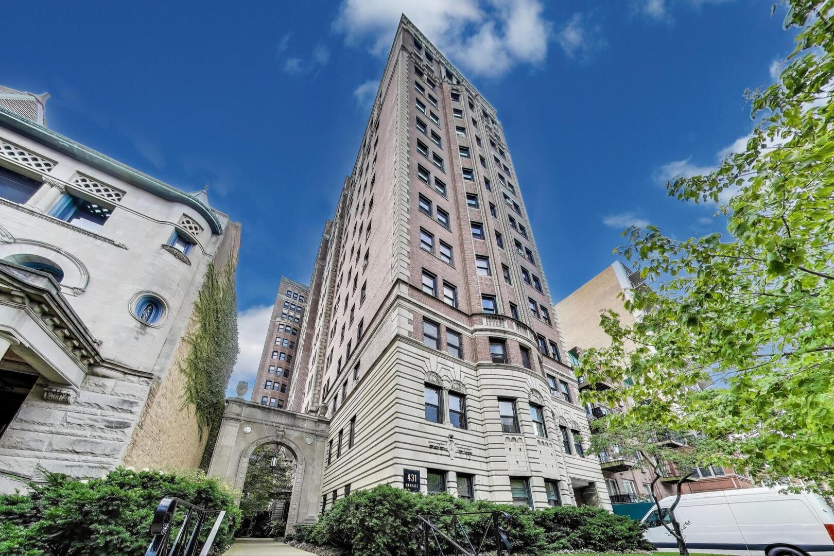 Architect-owned apartment located in a boutique prewar building in Lakeview, offering just two units per floor per elevator tier with separate passenger and freight elevators. Fully restored and thoughtfully updated, the home showcases architectural details such as refinished oak hardwood floors, crown moldings, chair rails and picture frame moldings, arched doorways, a decorative fireplace, and custom radiator covers. Modern comfort upgrades include all-new windows and central air-conditioning. The kitchen features high-end KitchenAid appliances, a new dishwasher, wine cooler, granite countertops, and a glass tile backsplash. The primary bathroom offers a mix of vintage and luxury with the original tub, a separate steam shower, marble tile, and Grohe fittings, while the second bath is outfitted with Ann Sacks limestone tile and Lefroy Brooks fittings. Technology upgrades include adjustable recessed and track lighting, Legrand Adorne touch dimmers, smart thermostat, smart smoke detectors, and full apartment wiring for sound, seamlessly blending classic charm with modern convenience.  Steps to Lake Shore Drive, the lake front, shopping, dining, night life, CTA bus routes and more.