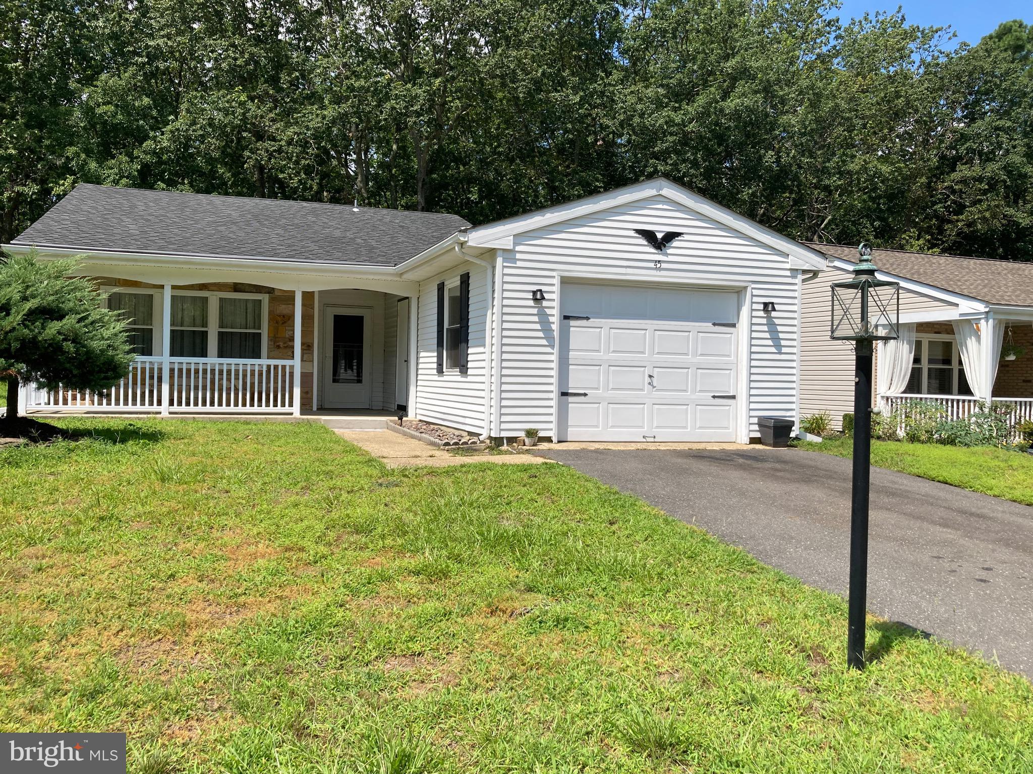 JUST REDUCED!!Opportunity awaits! Move in to the  desirable 55+ community of Leisuretowne. This is a great community with tons of activities for those who want to be involved.  Our 2 bedroom, one and a half bath home is perfect for those looking for a low maintenance home at an affordable price.  There are lots of clubs and activities for the young at heart or just enjoy the serenity of the Pinelands. The house is conveniently located off  the Route 70   entrance,   and is  close to the Settlers Hall Clubhouse and swimming pool. The living room is open flow into the formal dining room, allowing for easy  entertaining. The eat in kitchen  offers a full appliance package and plenty of room for informal meals. Step into the hall to find the laundry area, just outside of your bedrooms. The primary bedroom has a half for bath personal privacy.  A spacious front porch or a covered rear patio backing to the woods  give you lots of  room to enjoy the pinelands 3 seasons of the year.  The air conditioner was replaced in 2023. A one car attached garage is an amenity hard to find in this price range.  Make your appointment today - won't last long at this price!!Inspections invited for buyer information purposes, being conveyed "as is".Seller will consider short term financing  for qualified buyers.