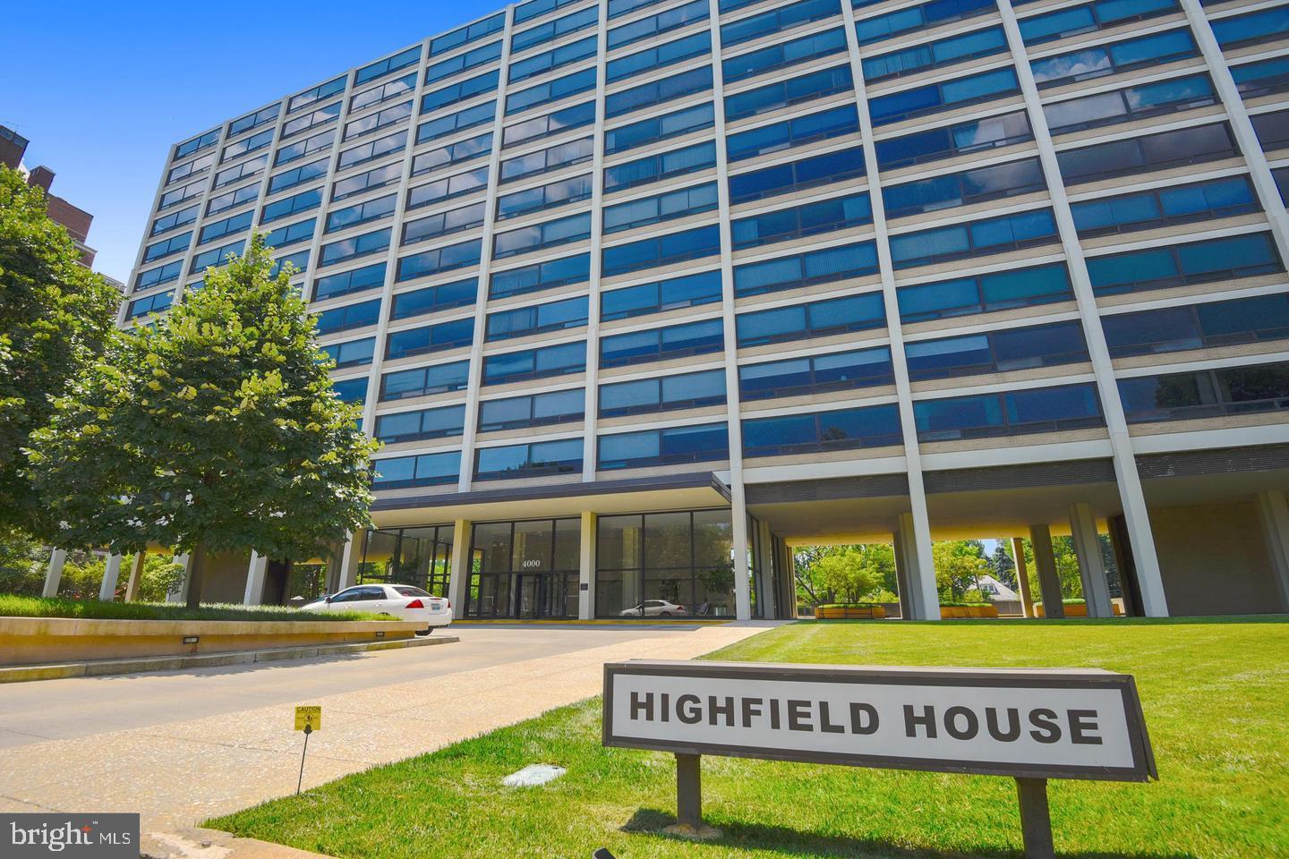 This is the condo you’ve been waiting for: completely updated with views of mature trees and WATER VIEWS of the Inner Harbor and all downtown Baltimore. This unit is perched on the 12th floor of the Highfield House: a masterfully maintained, National Register of Historic Places mid-century modern building, which has had upgrades to the roof, HVAC, windows, façade, elevators, pool, garage, and more over the past 10 years. Inside the unit itself, you’ll enjoy a wall of windows which brings light throughout the living space. The low maintenance flooring ties the living, dining, and office spaces together. The kitchen has been renovated to open up the space to the rest of the living level. Upgraded stainless steel appliances modernize the mid-century kitchen. The bathroom has been upgraded to feature a tile surround shower/ tub and a vanity with long quartz countertop, great for getting ready in the morning. The large bedroom lets in so much light and provides great views. The closet space within the unit is fantastic, but a storage locker space comes with the unit as well. Get more for your condo fees with gas, heating, cooling, and water all included on top of the following amenities:  swimming pool, 24/7 front desk, valet parking, a library/ meeting room, gym equipment, and storage locker. Compliant with the Maryland Condominium Law, the board has been proactive in maintaining the building. Just blocks from Johns Hopkins Homewood campus, provides a great central location. Parking available for rent for additional fee.