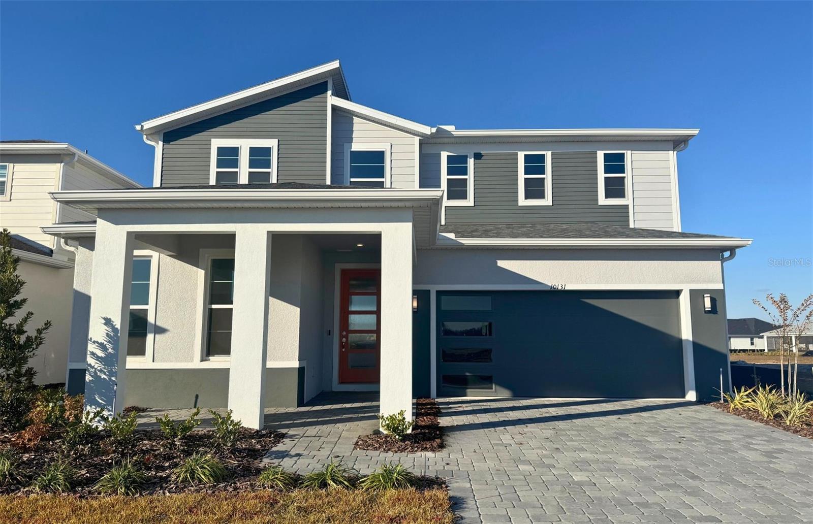 EverBe is a new master planned community where convenience and connections combine to create a new standard for home. Located in Orlando with quick access to 417 & 528, this lifestyle community will offer miles of pathways & trails, wi-fi-enabled green spaces, unique outdoor recreation areas, a fitness center, a clubhouse complex with resort pool, 2G internet, and a waterfront amenity and town center. Get excited for EverBe - everything home should ever be!Step into the Imperial, where luxury and convenience seamlessly combine to create a truly elevated living experience. This remarkable 5-bedroom, 3.5-bathroom home with a 2-car garage offers unparalleled craftsmanship and thoughtful design throughout. The open-concept layout flows effortlessly, creating an expansive, airy feel that exudes both sophistication and comfort. On the first floor, discover a private en suite bedroom with a walk-in closet and elegant quartz countertops—a perfect retreat for guests. At the heart of the home, the chef-inspired kitchen is a true masterpiece, featuring 42” soft-close cabinetry, striking quartz countertops and decorative tile backsplash. Whirlpool stainless steel appliances, including a built-in cooktop, make cooking a pleasure. The kitchen seamlessly connects to the café and gathering room, where a sliding glass door opens to the covered lanai, enhancing the flow of indoor-outdoor living. The first floor also offers a convenient powder room, perfect for guests. Upstairs, the luxurious owner’s suite is a private sanctuary, featuring a spacious walk-in closet and a spa-like en suite bathroom with quartz-topped dual vanity sinks and a frameless glass enclosed shower. The loft area provides the perfect space to unwind, while three additional bedrooms and a bathroom complete the upper level. For added convenience, a thoughtfully located upstairs laundry room simplifies everyday tasks. Beautiful tile flooring is found throughout the main living areas of the first-floor, bathrooms and laundry room, while plush, stain-resistant Shaw carpet can be found throughout the bedrooms, loft, and staircase. Designer-curated finishes elevate every corner of this home, including pendant light pre-wire, epoxy finished garage floor, wrought iron basket balusters with oak handrail at the staircase, and comfort height toilets enhance the home's style and comfort. This home is equipped with a smart thermostat, smart doorbell, surround sound pre-wire, digital IP camera pre-wire, and LED downlights, ensuring your home is as connected as it is beautiful. This home offers the perfect combination of luxury, convenience, and modern design—an ideal place to live and relax. Schedule a tour today!