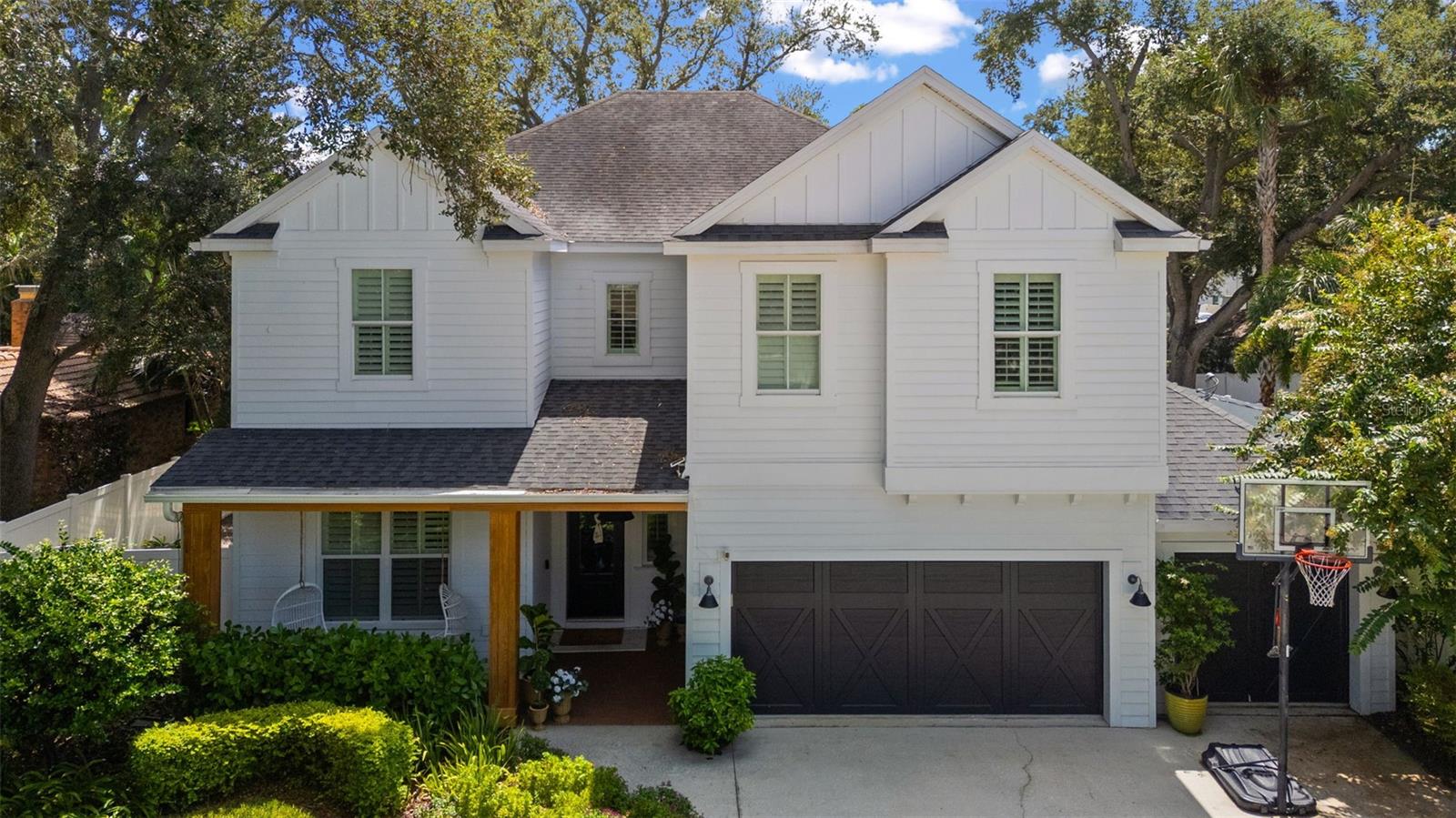 Under contract-accepting backup offers. Located in the highly sought-after Plant High School District, this beautifully updated 5-bedroom, 3.5-bathroom pool home offers a spacious, functional layout designed for both everyday living and effortless entertaining. Engineered hardwood flooring flows throughout the home, creating a warm and cohesive feel from room to room. At the heart of the home is the beautifully appointed kitchen, where an oversized island with generous seating creates a natural gathering place for family and friends. A gas range, abundant cabinetry, and ample prep space make the kitchen equally suited for casual weeknight dinners and hosting a crowd. The main floor offers exceptional flexibility with a secondary bedroom and full bathroom—ideal for guests, a home office, or multigenerational living. Thoughtfully designed with direct access from the outdoor living area, the bathroom also serves as a convenient pool bath. A separate powder room completes the main level. Outside, the home is made for enjoying the Florida lifestyle. The screened-in outdoor living area features a heated saltwater pool and covered lanai, creating a comfortable setting for year-round entertaining, outdoor dining, and relaxing by the pool. Beyond the screened enclosure, additional yard space provides plenty of room to play, garden, or simply enjoy the outdoors. With five bedrooms, a versatile floor plan, updated finishes, and an inviting pool and backyard, this home offers the space and functionality buyers are looking for—all in one of South Tampa’s most desirable school districts. A close walk to the South Tampa YMCA, the Palma Ceia Little League fields, and the iconic Bayshore Boulevard!