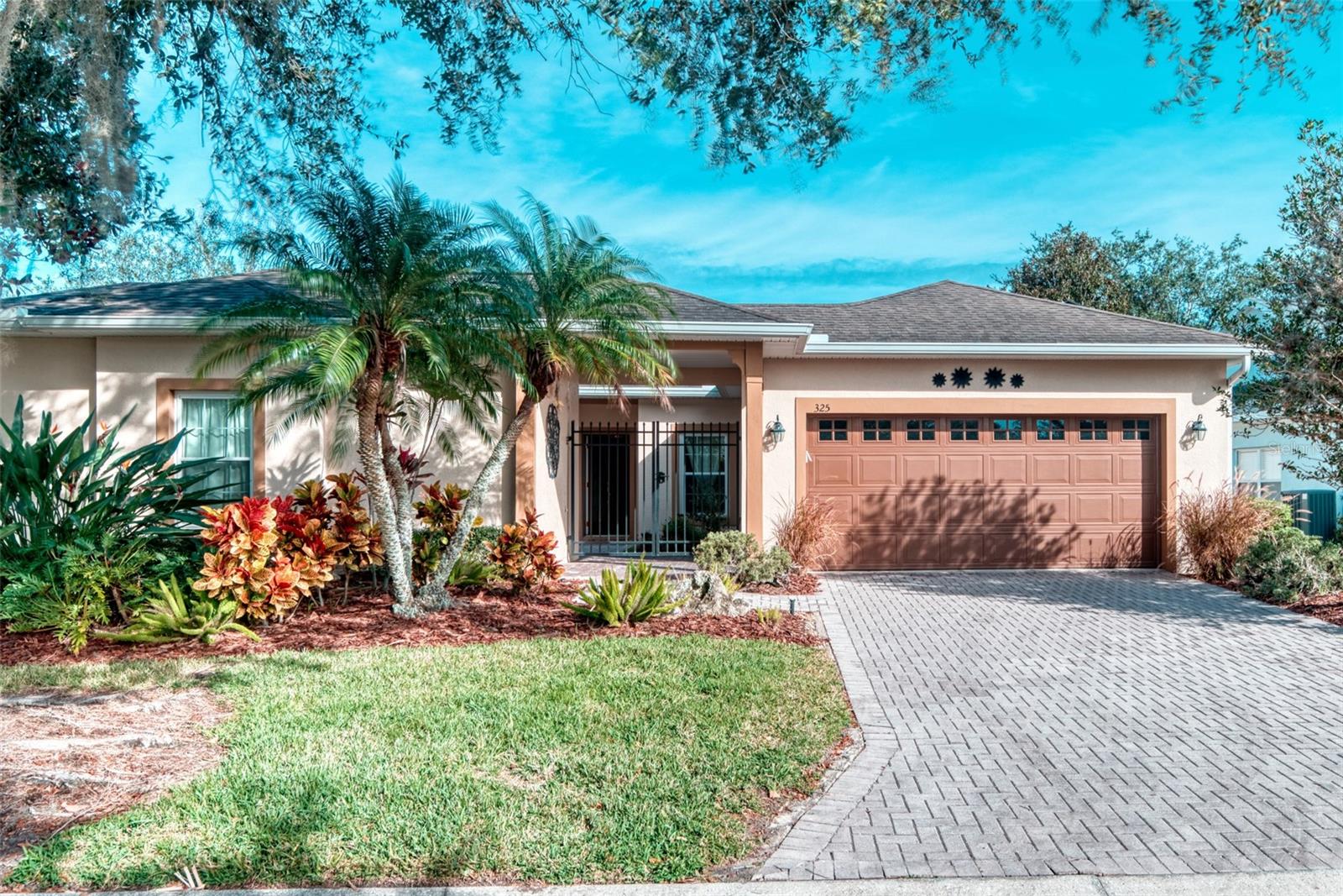 **3D Matterport walk through at Video Tour Link 1**Welcome to your dream home in the award-winning 55+ community of Solivita, Central Florida's premier resort-style paradise! This stunning BOLERO floor plan with SEPARATE IN-LAW SUITE/CASITA, has been meticulously updated and is move-in ready, offering the perfect blend of luxury, comfort, and effortless Florida living. Highlights include:  breathtaking VIEWS of a gorgeous pond backing up to peaceful woods from the front of the house; energy-efficient and cost-saving SOLAR panels (fully paid off at closing!) keep your electric bill UNDER $50/month—even at the peak of summer! A Solatube for more natural light in the living room, a laundry room with utility sink, and just a short walk away is the neighborhood pool, part of Solivita's incredible amenities! Step through the elegant leaded glass front door into a bright, open interior featuring ceramic tile in the main living areas, and brand-new luxury vinyl plank flooring in all three bedrooms —NO CARPET anywhere! The entire house has been FRESHLY PAINTED for a crisp, modern feel. The heart of the home is a true CHEF’s KITCHEN designed for both everyday living and entertaining: Here you'll find rich CUSTOM cherry cabinets, gleaming GRANITE countertops, a large granite-topped center island, stylish pendant lights, a double oven, newer appliances, convenient PULL-OUT cabinet shelves, center island with storage, and a spacious pantry just steps away. Enjoy casual meals in the sunny breakfast nook, or host formal dinners in the separate dining room. The expansive THREE SEASON LANAI is your private outdoor retreat, boasting a tiled floor and ceiling fans to keep it cool. Access it effortlessly through triple sliding doors from the living room or directly from the breakfast nook. Imagine your morning coffee or evening cocktail, in total tranquility: The primary suite is a true sanctuary, complete with two spacious walk-in closets, a large walk-in shower, and sliding doors opening to the lanai. A second bedroom also features direct access to the peaceful courtyard, while the versatile casita/in-law suite offers endless possibilities—perfect for guests, office, hobby room and more. The ROOF (2016) and HVAC (2020) provide peace of mind for years to come. Your slice of paradise awaits—schedule your private showing today!**Solivita is an active adult 55+ community located in Kissimmee, Florida.  About 50 minutes from Disney World & Orlando International Airport.  Solivita has a total of 5470 homes.  Approximately 10K–11K residents live in Solivita during the winter while approximately 7,500 live in Solivita during the summer.  Solivita’s amenities include: SOFTBALL Diamond & Field, 36 holes of CHAMPIONSHIP GOLF (Must join the Stonegate Golf Club or pay as you go), 2 STATE of the Art AMENITY centers with exercise equipment, yoga studio, meeting rooms , 3 RESTAURANTS, 14 HEATED POOLS, 17 PICKLEBALL courts, 9 TENNIS courts, COMMUNITY GARDEN. Over 250 resident CLUBS.  HOA: maintains LANDSCAPING & IRRIGATION systems, all community roads, provides SECURITY with gate guards and mobile patrols, allows AUTOMATED GATE ACCESS for residents via LPR, provides residents with Fiber Optic Internet & TV. *Poinciana Lakes Plaza is a MAJOR NEW SHOPPING CENTER directly across from the Main Gate.  Sprouts Grocery, TJ Maxx, Ross, Burlington, Ulta, Outback, First Watch, 5 Guys, Jersey Mikes, Panda Express, Petco, Urgent Care, Dentist & More!