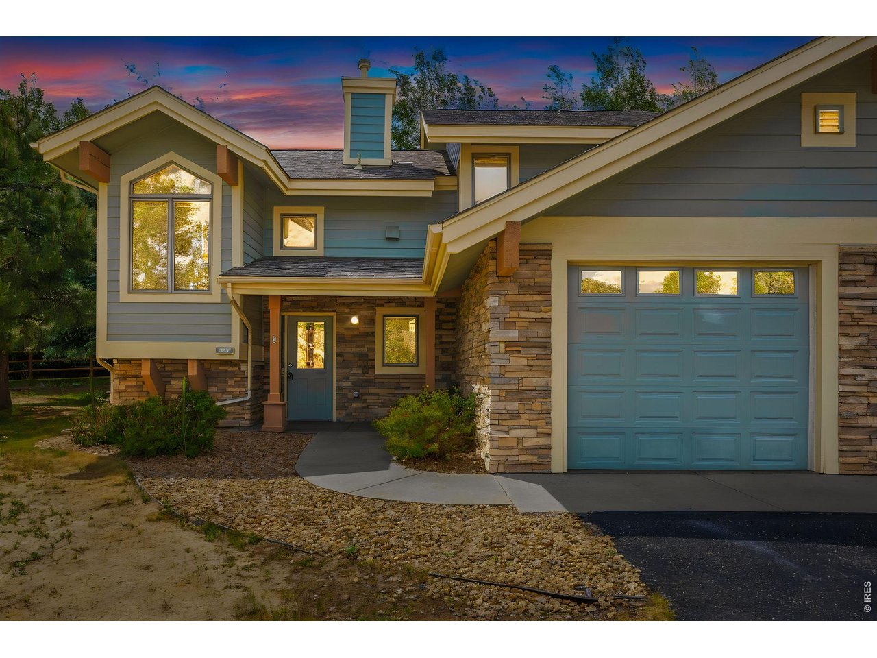 Open space runs along the side of this end unit, filled with mature pine, aspen, and native grasses, so the windows on that side open to natural light and a Colorado view instead of a neighbor's wall. It is an outlook the interior units do not get.Inside, the kitchen, living room, and primary suite all sit on the main floor, along with the laundry, the pantry, and the attached garage. The whole rhythm of daily life happens on one level, which is the part most people do not realize they want until they have it. A gas fire place anchors the corner of the living room, and a concrete patio off the back adds the outdoor space.Upstairs, an open loft overlooks the living room, bright and open, ready to be an office, a reading spot, or a place for guests to land. Two more bedrooms, two walk-in closets, a built-in bench seat with storage, a linen closet, and a separate storage area mean there is a place for everything. The upstairs bath has a newly installed shower.Together it adds up to the best of both worlds: the convenience of a condo with thespace of a three-bedroom home.Vista Ridge keeps things easy, with paved sidewalks throughout and a nearby stop onEstes Park's free seasonal shuttle. The Blue Route runs every half hour from 9 in the morning to 9 at night, daily from July 1 through August 31 and on weekends September 5 through 27, a free ride into town without moving your car. You are inside Estes Park here, minutes from downtown, the Riverwalk, and the road into Rocky MountainNational Park. Whether this becomes full-time mountain living or the place you have been picturing for weekends, it is an easy home to settle into. Reach out when you are ready to see it in person. Seller offering $10,000 credit to carpet and paint.