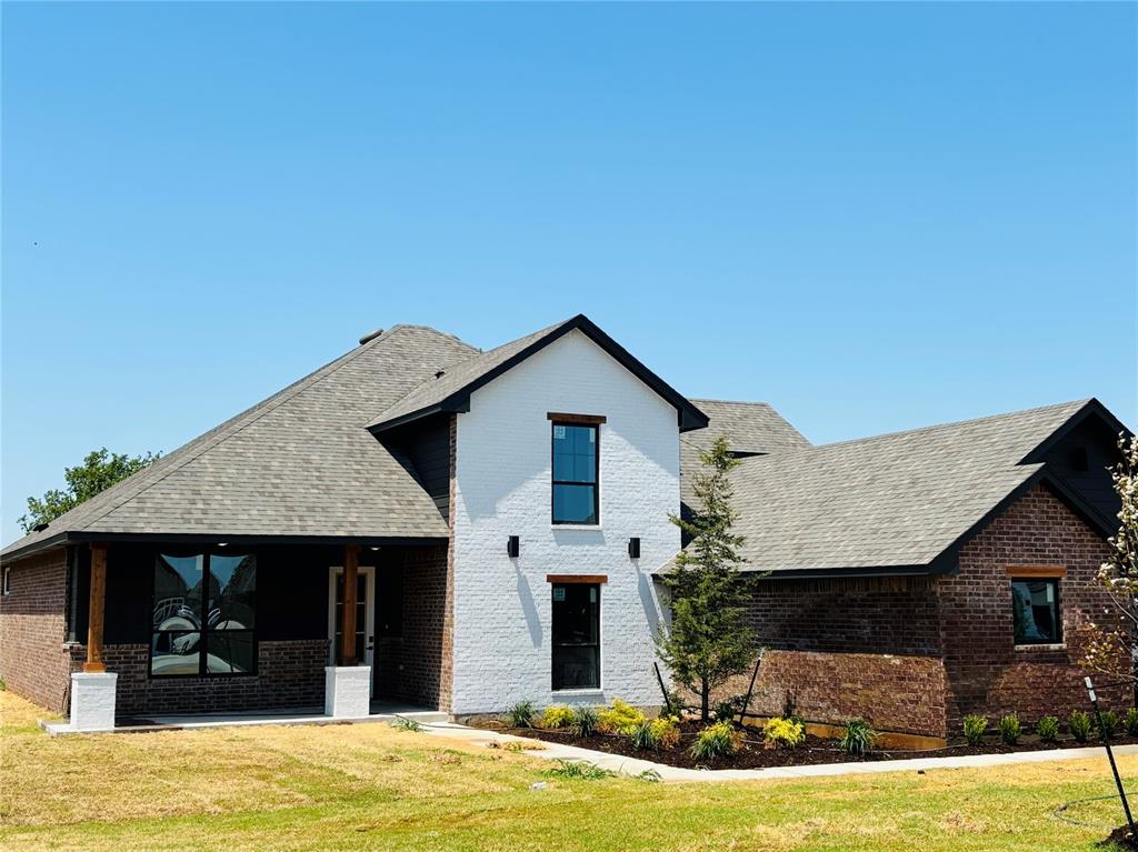 Hot Listing — Act Fast! Closing Costs Covered & Shop-Approved!
This stunner won’t last long! Reserve it before it's even completed and be the envy of Blue Ridge! From the moment you step inside, you'll be blown away by the open layout, rich wood-look tile floors, and jaw-dropping floor-to-ceiling stone fireplace.

Chef’s dream kitchen alert: massive quartz island, custom cabinetry, Samsung built-in appliances, walk-in pantry, under-cabinet lighting, vented wood hood, and even a trash drawer in the island!

The primary suite on the first floor-next-level—with a cozy tech nook, sliding barn door, spa-style bathroom featuring a freestanding tub and walk-in tiled shower, and a walk-through closet that connects directly to the oversized utility room.

Bonus features? Absolutely. Mud bench off the garage, huge covered patio for hosting, and direct access to all the OKC hot spots via HWY 9, I-35, and I-44.

This is the one your heart’s been waiting for—let’s grab it before someone else does.