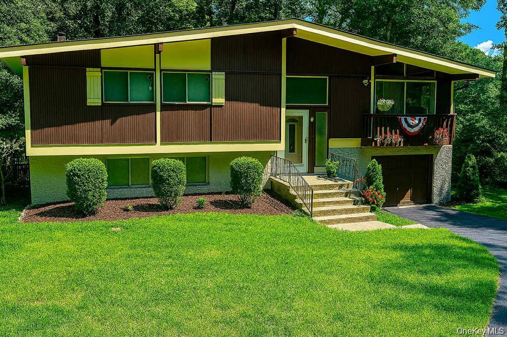 Executive Raised Ranch 4 beds 2 Bath home. Enjoy comfort and sophistication with red oak hardwood flooring, recent upgrades like a new roof, boiler. Large living room with ample space for holiday gatherings. Entertain effortlessly with three freshly stained multi-level decks, perfect for parties and functions. Large yard to enjoy outdoor activities, with three sheds, offers plenty of storage . Located in Chappaqua P.O. within the prestigious Pleasantville School system, enjoy convenience with a Rare FREE SCHOOL BUS PICK UP! in a walking school district of Pleasantville!!! On a Cul-de-sac. Easy 5-minute walk to the Chappaqua Train station just 45 minutes to Grand Central Station. Park-like grounds, fostering freedom and adventure. Inside, cathedral ceilings and Red Oak hardwood floors elegance, comfort and style in a coveted Chappaqua location with attached garage, minutes to Farmers market shops train and restaurants.