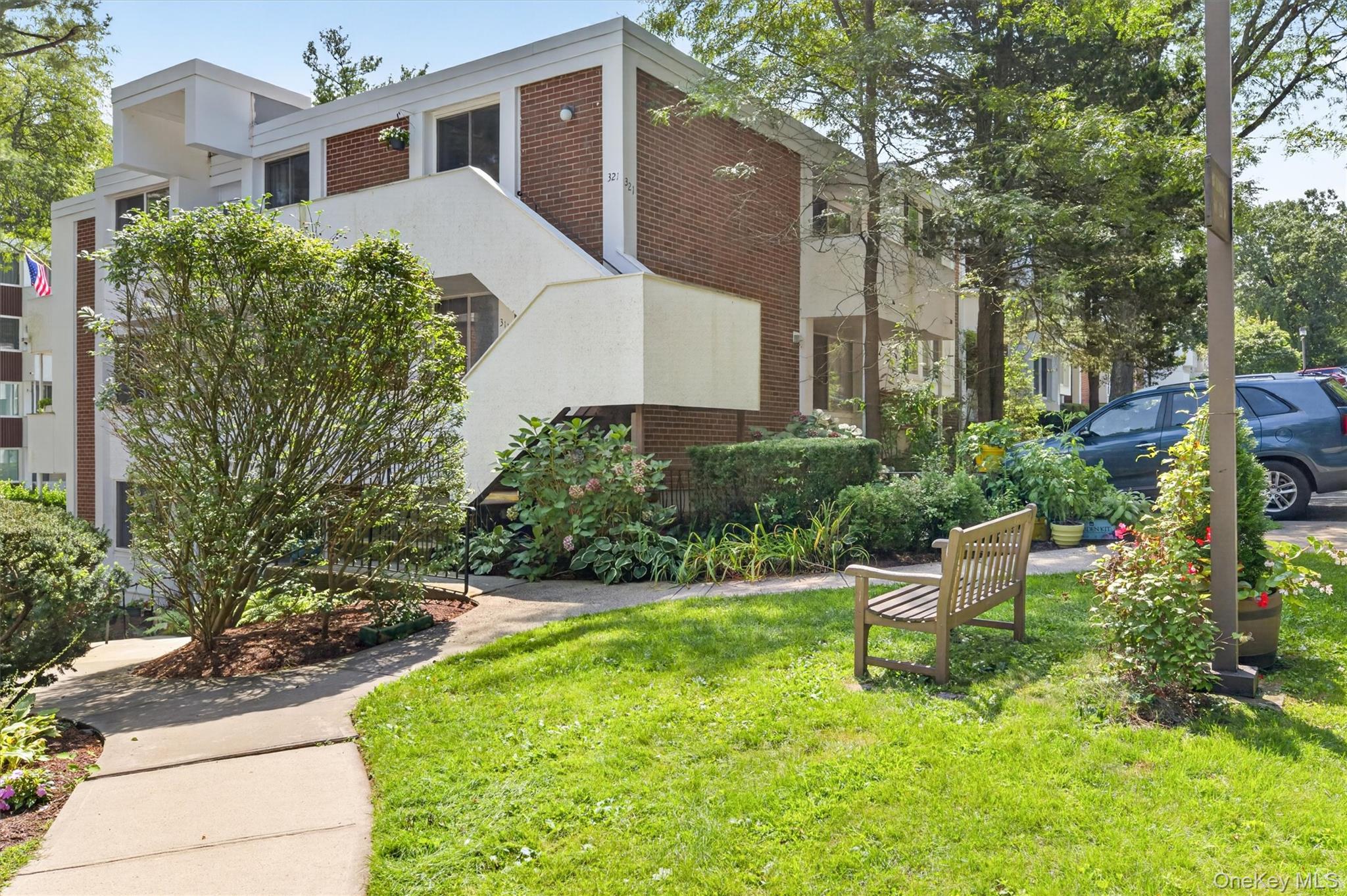 Welcome Home to The Colony!  Spacious 3 bedroom, 2 bath home on lower level but perfectly sited on the 1st level.  Every convenience at your finger tips - located between Hartsdale village and vibrant downtown White Plains.  Minutes from restaurants, shopping, farmers markets trails, hiking, parks and Metro North stations - 35 minutes to Grand Central.  Once you step inside the entry you will know you are home.  Oversized living room flows into the dining room with sliders out to the covered balcony.  Eat-in-Kitchen, 3 large bedrooms.  Primary ensuite with great closets.  Storage room, Beautiful community pool and playgrounds.  This is everything you are looking for.  Come see it today