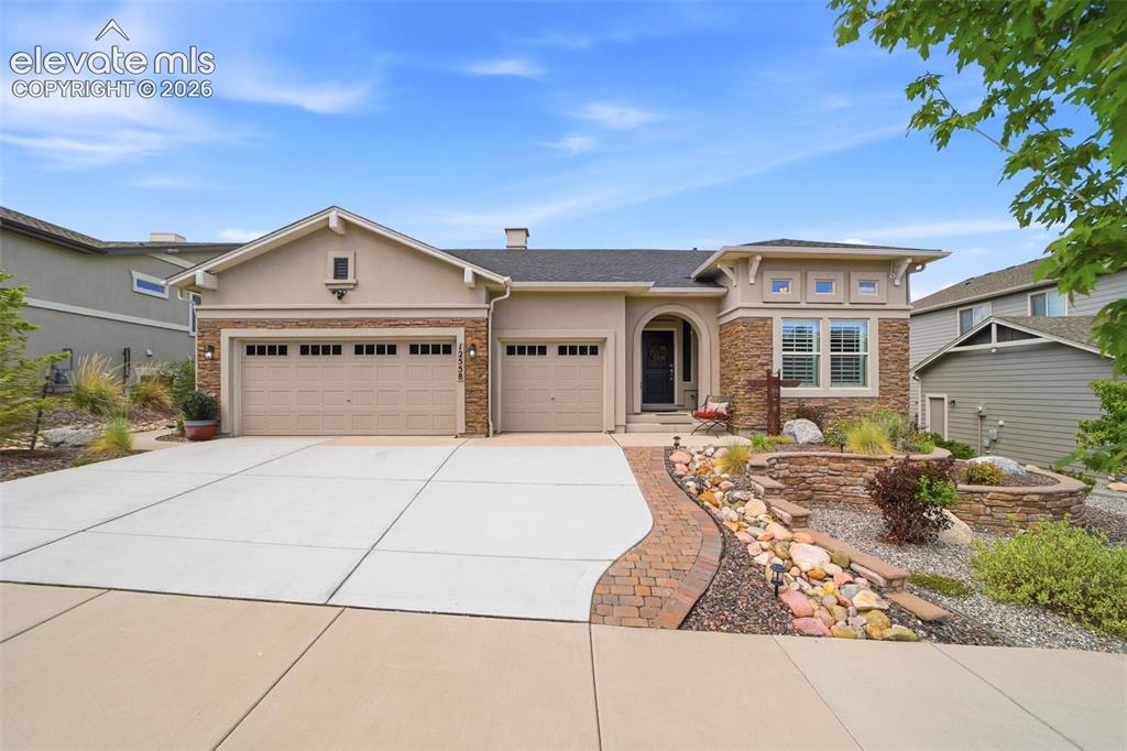 Exceptional opportunity in the highly desirable Flying Horse community * Built in 2017 offering over 4,100 sq ft, this one-owner home is thoughtfully designed & well maintained offering an outstanding combination of size, comfort & value * Open-concept main level features a spacious great room anchored by a striking stone fireplace, creating an inviting atmosphere for both everyday living & entertaining * Well-appointed kitchen with large center island, striking solid surface countertops, custom expanded cabinetry, stainless steel appliances, breakfast bar & eating nook *  Stroll through the Butler’s Pantry to the dedicated dining room * Light & bright, the main level primary suite has beautiful windows, luxurious 5 piece bath, walk-in closet & pass thru to convenient laundry * Second bedroom / office on main is complimented by a full bath * Finished lower level is an entertainers paradise offering versatile space for recreation, media, fitness, hobbies or additional gathering areas * Large, step behind, wet bar with Beverage fridge & separate Wine fridge * Rec area & gaming space a plus * 2 Additional bedrooms with large closets & 3rd full bath complete the lower level * Step outside to enjoy the 17x20 expanded deck, ideal for outdoor dining, relaxing & taking in Colorado's beautiful seasons * Privacy & serenity apparent * Huge 29x20 Storage area * Central air & humidifier for your comfort * Impeccable landscaping front & back * The home's functional floor plan, generous room sizes & abundant living spaces make it an outstanding choice for those seeking both comfort & practicality * Curb appeal is a “10” * Located within the award-winning School District 20 & Flying Horse Country Club Community, residents enjoy proximity to 2 championship golf courses, Tennis, spa, pools, dining, shopping, entertainment, parks & convenient access to I-25 for an easy commute throughout Colorado Springs & beyond * Look here first - Membership to club not included. HURRY, won't last!