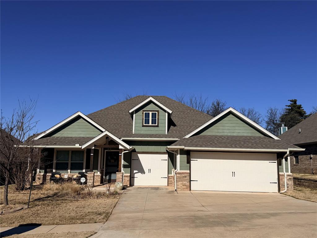 This beautifully designed 4-bedroom, 2-bath home blends comfort, craftsmanship, and thoughtful upgrades throughout. Wood-look tile flooring runs through the main living areas, creating a warm, cohesive feel. The living room is anchored by a striking stacked-stone gas fireplace, framed by a coffered ceiling and oversized windows that flood the space with natural light.The kitchen is a true showpiece with stainless steel appliances, cabinetry extended to the ceiling, an oversized island perfect for gathering, a spacious corner pantry, and a stunning designer backsplash.The primary suite is a private retreat, featuring elegant box-ceiling detail with soft incandescent rope lighting. The spa-inspired ensuite offers a massive walk-in closet with seasonal hanging space, a large walk-in shower with herringbone-pattern tile flooring, and a luxurious Jetta whirlpool tub.Step outside to a covered back patio built for entertaining, complete with an outdoor fireplace, gas line, and cable and electrical hookups—ideal for relaxing evenings or game-day hosting.Additional highlights include an underground sprinkler system, whole-home air filtration, a Rinnai tankless water heater, R-44 insulation, and a TechShield radiant barrier for year-round efficiency. The 3-car garage includes an in-ground storm shelter, providing peace of mind and extra storage.A home designed for both everyday living and unforgettable moments—8009 Sweetgum delivers comfort, style, and smart construction in one exceptional package.