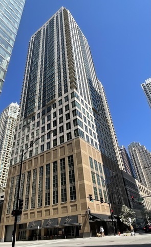 Must see!!!  Fully updated high floor 1 bedroom 2 full bath unit, approximately 1300 square feet. Formally a 2 bedroom unit converted into a sprawling one bedroom open-floor plan. Can easily be converted back to a two bedroom if you desire. Floor to ceiling windows with power shades throughout, tons of natural sun light, unobstructed south and west views. Beautiful maple floors throughout, in unit washer and dryer, balcony. Full amenity River North building with gym, rooftop sundeck, party room, dry cleaners, 24hr door staff. Additional storage unit included. Within walking distance to Chicago's best restaurants, shopping, CTA redline, expressway access and more! Prime extra wide deeded indoor parking spot $35,000 additional.