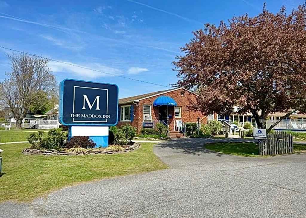 Prime investment opportunity in a highly visible location at the entrance to Chincoteague Island. The Maddox Inn offers up to 26 guest accommodations, including twenty-four rooms, recently remodeled standalone cottage, and small trailer, allowing multiple room types and flexible rental options. Select guest rooms feature jacuzzi tubs! Main building has space suitable for owner occupancy or on-site management for efficient operations. One of the islands favorite bakeries is next door, offering easy access to quality pastries and coffee for guests. Located within a mile of downtown and Maui Jacks Water Park, and approx. five miles from Assateague Beach and the NASA visitor Center, the property is well positioned to benefit from steady tourism demand and repeat guests.