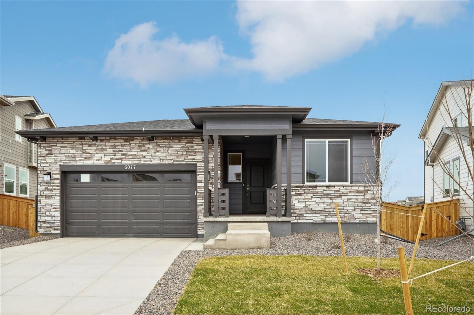 Welcome to this stunning ranch style home featuring a charming stone and siding exterior that offers both curb appeal and durability. Step inside to a welcoming foyer that seamlessly connects to two spacious guest bedrooms, providing comfort and privacy for family or visitors.

The thoughtfully designed layout includes a separate laundry room, ensuring convenience and organization and a deep garage and entry bench to take off your shoes after a long days work. The heart of the home boasts an open-concept kitchen, gathering area, and dining room, all adorned with ample windows that flood the space with natural light. The kitchen itself has oversized 42" white cabinets and 4" quartz counters making it a chef's dream.

Retreat to the primary bedroom, where large windows provide plenty of natural light. The en-suite bathroom offers a walk-in shower with a convenient bench, a generous walk-in closet, and dual sinks offering ample counter space.

This home perfectly balances functionality with style, making it ideal for both daily living and entertaining. Don't miss your chance to experience this exceptional property!
