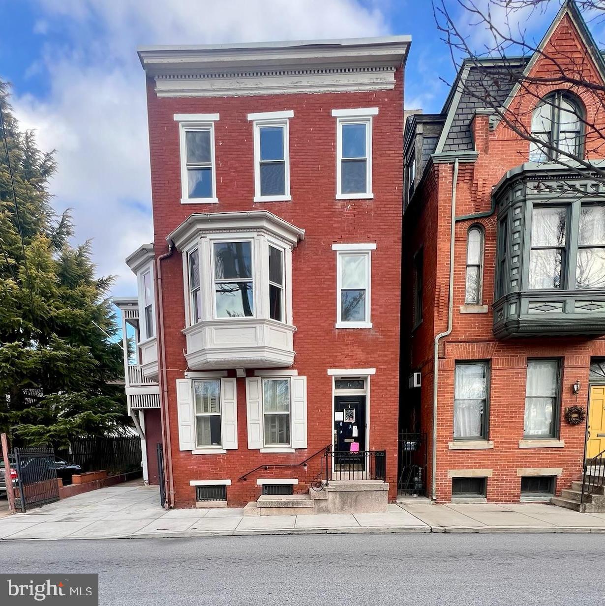 Welcome to a rare opportunity in the heart of Downtown York.This expansive 5-bedroom, 1.5-bath detached home offers the size, character, and location today’s buyers are looking for at a price point that leaves plenty of room to build equity.Brimming with classic charm, the home features a blend of hardwood floors and durable LVP, abundant natural light, and ceiling fans throughout. The open-concept living and dining area creates a welcoming flow ideal for entertaining or everyday living, while the generously sized kitchen provides ample cabinet and counter space and includes a stove, refrigerator, microwave, and dishwasher.Upstairs, you’ll find five spacious bedrooms, including a standout primary bedroom with beautiful bay windows and a private half bath, a rare bonus at this price point. Additional highlights include washer/dryer hookups, ample storage, a tub/shower combo, a side porch entrance, a covered second-floor balcony, and gated off-street parking, an exceptional find in the downtown area!Located just steps from everything Downtown York has to offer, enjoy walkable access to Central Market York, The Handsome Cab, and The Yorktowne Hotel. Nearby attractions also include Cherry Lane Park, Keystone Kidspace, and the Appell Center for the Performing Arts bringing culture, dining, and entertainment right to your doorstep.Offered AS-IS, this home needs only light TLC and has a strong rental history. Current market rent $1650-$1700/month making it an excellent opportunity for:Investors seeking strong equity potentialBuyers looking to personalize a large homeHouse hackers or long-term rental strategiesIf you’ve been searching for space, location, and upside without the premium price tag, this Downtown York property checks all the boxes!! Showings to begin Friday 1/02/2026.