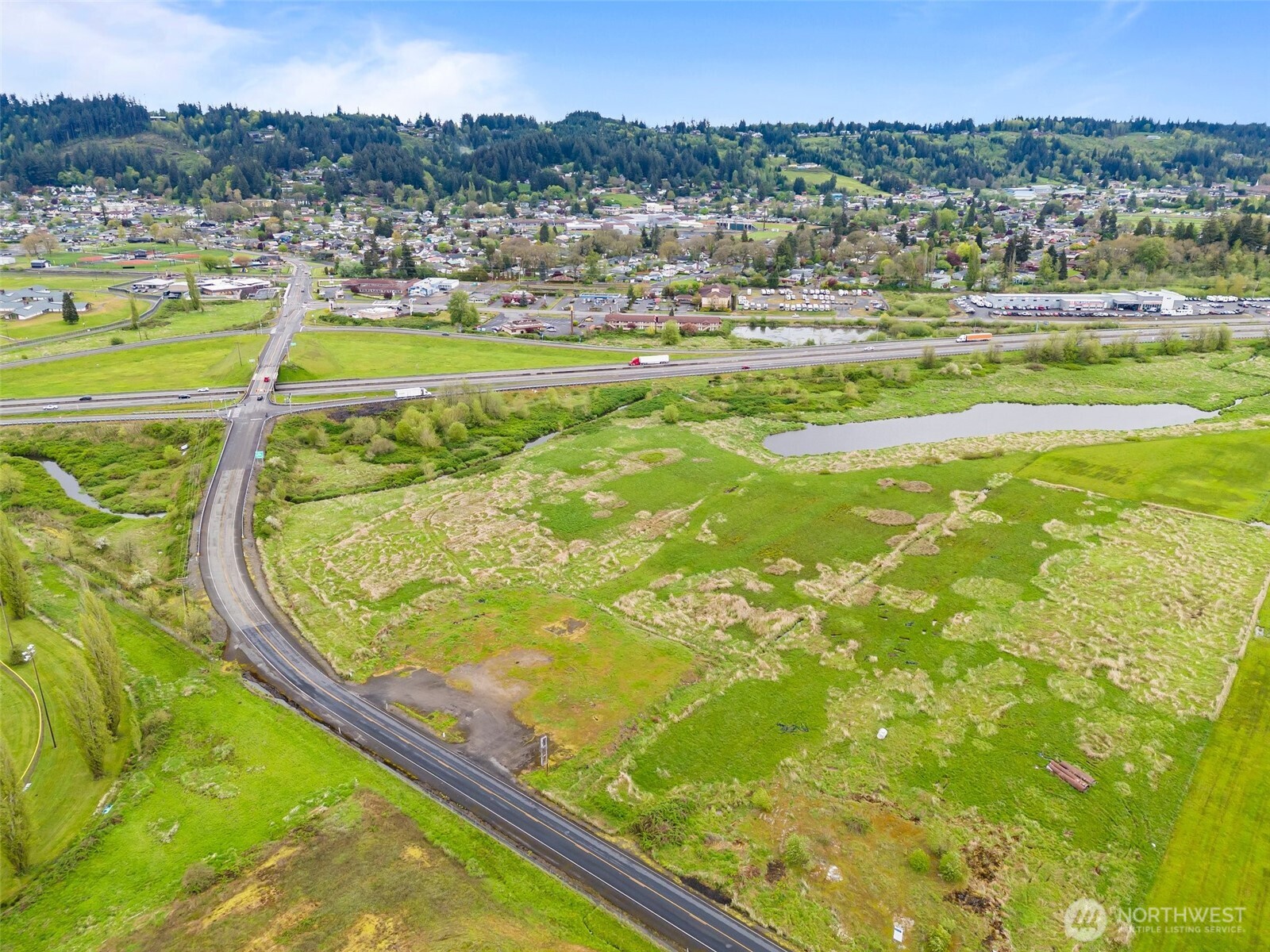 Freeway Commercial. Adjacent Southbound on ramp for I-5 at Exit #76. Super easy access to I-5 and at the midway point between Seattle and Portland. Near two active and growing Port Districts of Centralia and Chehalis. Located in the City of Chehalis UGA, this Commercial - General Zoned 8.69 acre parcel has a multitude of potential use types. Use provided Geotech report that supports construction of up 5 story building on 12,000 foot print, or submit for your own specific needs. Other reports available include, Pollution Prevention Plan, Drainage Report, Civil Designs, Survey, Final DNS,. City Water and Sewer details available.
