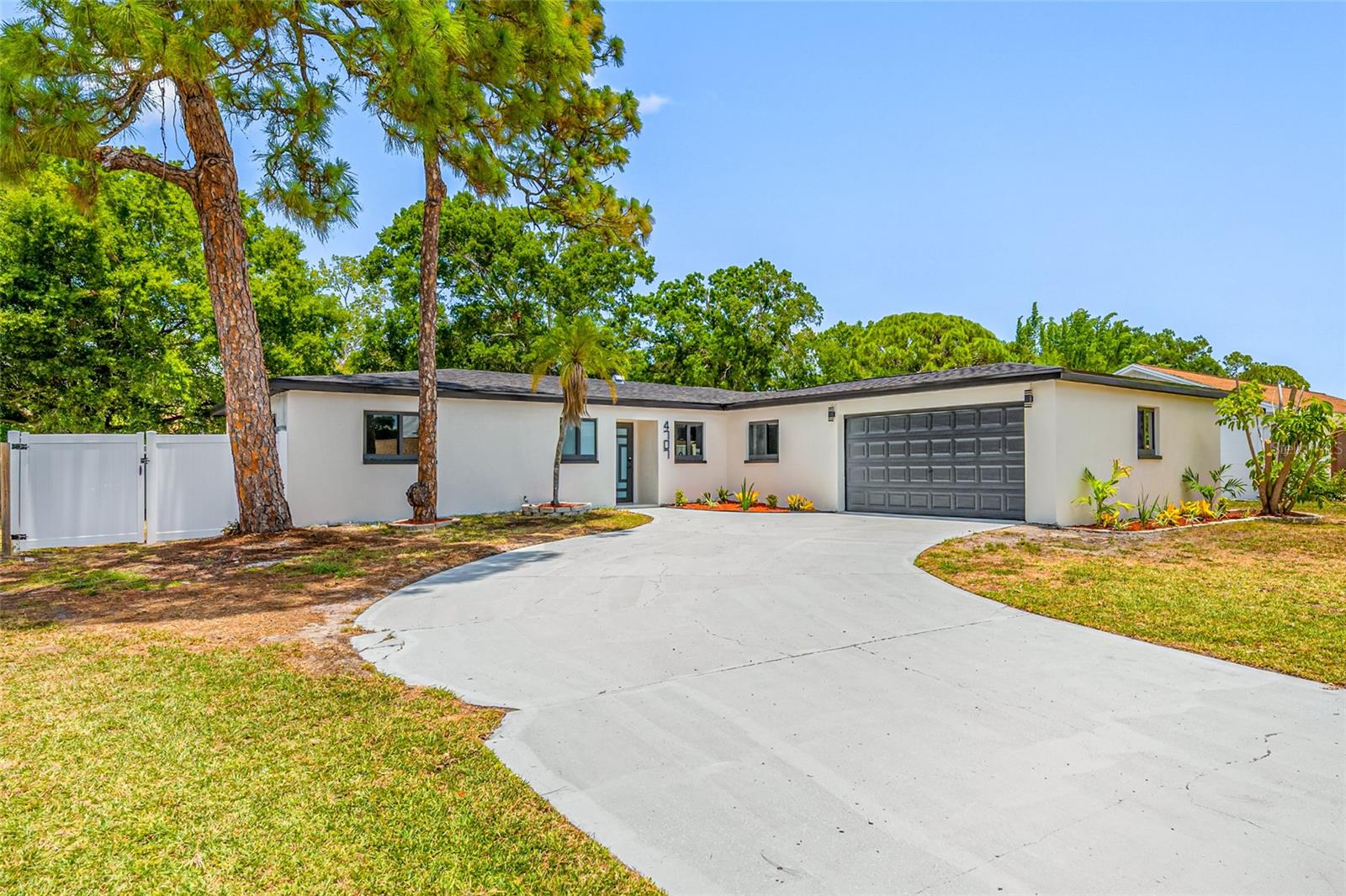 Virtually Staged. Welcome to this beautifully remodeled 3-bedroom, 2-bathroom home in the desirable South Tampa area! Move-in ready and thoughtfully updated, this residence features modern finishes throughout, elegant porcelain flooring, brand-new appliances, fresh interior and exterior paint, and stylish contemporary accents. Major improvements include a new roof, offering added peace of mind. The functional floor plan includes a bright breakfast area, a dedicated laundry room, and an attached two-car garage with ample storage and everyday convenience. Step outside to a fully fenced backyard with durable vinyl fencing, providing privacy and space to relax, entertain, or enjoy outdoor activities. Ideally located near Marina Pointe, popular dining destinations, shopping, and entertainment, this home combines modern comfort, convenience, and the best of South Tampa living. Don't miss the opportunity to make this beautifully updated home yours!