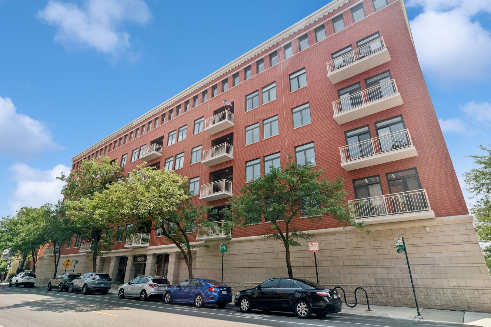 You have been waiting all year for this one! This coveted South facing terrace unit in sought after Lincoln Park boutique elevator building will not disappoint! One of the largest 2 bedroom floorplans, this CORNER unit is flooded with light, offers endless space and storage and has been updated with today's finishes so that you can move right in! Formal entry features a gallery-style hallway that can create both drama and intrigue with your collection of art. Oversized living room offers an incredible opportunity for your largest furnishings and gatherings and leads directly out to your 17x9 private terrace overlooking tree lined Maud St. This ideal set up also offers a separate dining space that is perfectly situated directly next to your updated kitchen. Stunning white kitchen features tons of cabinetry, glass panels for some of your showcase pieces, amazing quartz tops and backsplash & all Stainless Steel appliances including wall oven & 5 burner gas cooktop. The split bedroom floorplan is ideal for privacy, with each one being very generously sized. The primary suite cannot be beat with 2 walls of closets, room for a sitting area plus the most stylish new bathroom with free standing walnut vanity, quartz tops, STUNNING herringbone marble flooring, custom fixtures, lights & mirror plus a Jacuzzi tub for soaking at the end of a long day. 2nd bathroom is equally as beautiful with designer flooring, new custom vanity, quartz, fixtures & lighting. Chef's kiss! You will want to start and end each day on your dreamy sun drenched terrace; Either morning coffee or a proper drink at the end of the day, it is the perfect place to unwind and gaze at the tree tops down the quiet dead-end street. All of this plus heated garage parking and full sized extra storage included!! Unbeatable location with shops, restaurants and public transportation right at your fingertips!
