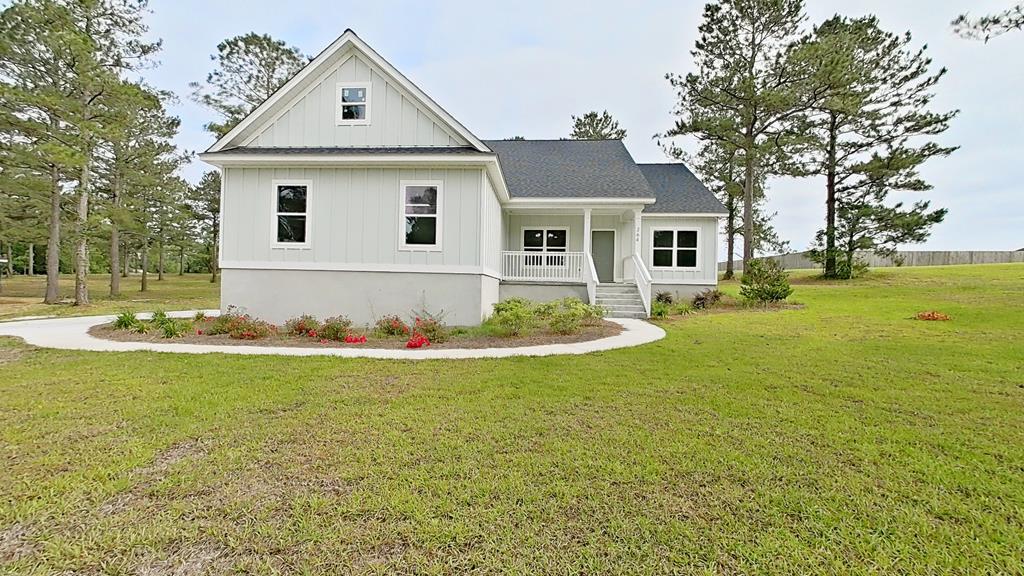 Welcome to your dream home! This under-construction 1,638 sq ft residence offers a perfect blend of modern design and comfortable living. Nestled on a generous 1.5-acre lot, this 3-bedroom, 2-bathroom home provides ample space for both indoor and outdoor activities. This property should be completed by late summer. Step inside to discover a spacious kitchen, complete with a breakfast bar island that seamlessly opens to a large living room and formal dining area. This open-concept layout is perfect for entertaining guests or enjoying family meals. The split floor plan ensures privacy and tranquility in the primary suite, which features a luxurious garden tub, a separate shower, and a private toilet area. The walk-in closet is designed to meet all your storage needs, offering plenty of space for your wardrobe. Convenience is key with a mudroom and laundry area, accessible directly from the attached 2-car garage. This practical addition helps keep your home organized and clean, providing a dedicated space for laundry and storage. This home is a perfect blend of style, comfort, and functionality, making it an ideal choice for anyone looking to enjoy a serene and spacious living environment. Luxury vinyl plank and tile throughout the home offer a blend of style and practicality, ensuring your home remains beautiful and functional for years to come.