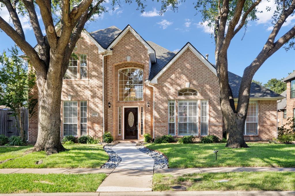 Tucked away on a picturesque tree-lined street in one of West Plano’s most sought-after neighborhoods and zoned to top-rated Barksdale Elementary (Plano ISD), this home perfectly blends classic design and a prime location. Step inside the light-filled two-story foyer, where a sweeping split staircase creates a dramatic first impression and connects the entry and kitchen with effortless flow. The formal living area boasts soaring ceilings, expansive windows with plantation shutters and stately columns that open to the formal dining room ideal for gatherings and everyday entertaining. The layout flows seamlessly from formal living and dining areas into a spacious kitchen with a big walk-in pantry, a large breakfast nook complete with a charming window seat and an inviting family room centered around a cozy gas fireplace. The floor plan offers exceptional functionality and flow with four spacious bedrooms plus a private study with wood flooring, built-in shelving and a generous walk-in closet—a space easily adaptable as a fifth bedroom or home office. The oversized primary suite serves as a true retreat, offering a spacious sitting area, two expansive walk-in closets, and a wall of windows that fill the room with natural light while framing serene views of the backyard. A private door provides direct access to the outdoor patio and backyard. Upstairs, discover three large secondary bedrooms, two full baths, and a bright, open game room with wood flooring. The large backyard is fully turfed for year-round beauty and low-maintenance living, a perfect setting for play, pets or outdoor entertaining. Recent improvements include all new interior paint (walls, baseboards, and doors), brand-new carpet throughout, LED lighting, thermostats and updated ceramic tile in the primary bathroom. A premier West Plano location with easy access to shopping, dining, hospitals, major freeways, and local airports.