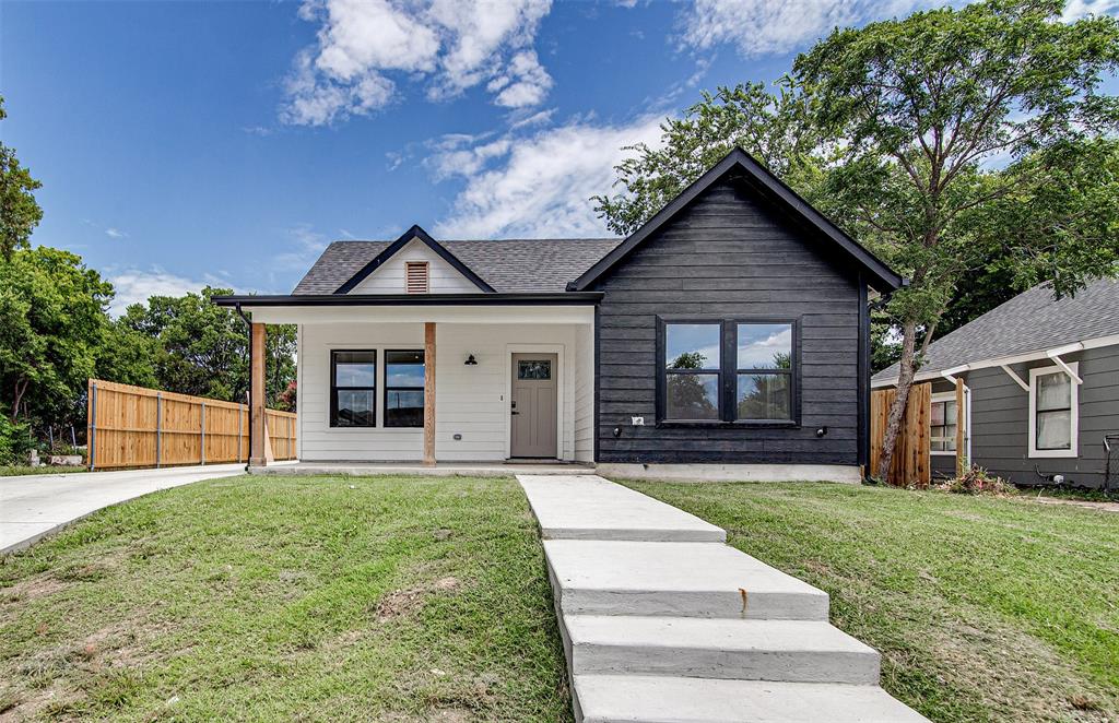 From the moment you arrive, this stunning new construction home welcomes you with a charming front porch. As you step inside, you're greeted by a spacious open floor plan. Hardwood flooring throughout the main living spaces and bedrooms. The living room features a gorgeous chandelier with a built-in electric fireplace. The dining area features its own statement chandelier, seamlessly flowing into the show stopping kitchen.  In the heart of the home, the kitchen boasts with an island,  a sit-in kitchen,  quartz countertops with dramatic gold veining, a farmhouse sink and a white tile backsplash. The primary suite is a peaceful retreat, featuring a boxed ceiling, a designer ceiling fan, and a spa-inspired ensuite bathroom, the double vanity, with a stand up shower and a nice size walk -in closet with built ins. The split bedroom floor plan ensures privacy with the other two bedrooms located on the opposite side of the house, both bedrooms are spacious with walk in closets.  The main bathroom features a glass enclosed tub-shower combo and elegant gold accented fixtures for a cohesive, upscale look.  There is a detached garage at the end of a long driveway and a covered back patio overlooking a nice sized yard. The home also features recessed lighting throughout the house.   Don't miss the chance to make this stylish and thoughtfully designed home yours!