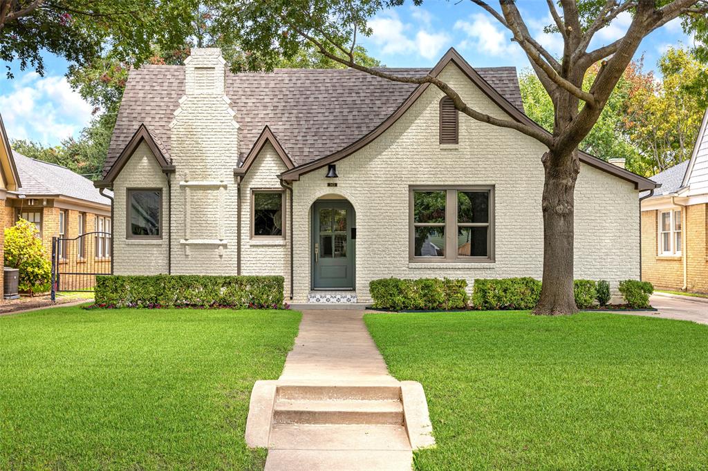 Opportunities to own a timeless Tudor under $1M—where period architecture, modern upgrades, and a premier location converge—are rare. Gracefully renewed, this piece of Dallas history is ready for its next chapter. Set in the heart of Dallas’ beloved M Streets, this exquisite 1920s Tudor is a study in timeless architecture and thoughtful reinvention. Zoned to highly regarded Mockingbird Elementary, mature trees set the stage for the character and elegance within. Beyond the threshold, original hardwoods—meticulously restored—carry the rich patina of nearly a century. Abundant natural light, a striking modern fireplace, and an open living and dining floor plan create inviting spaces that transition effortlessly from quiet afternoons to elegant evenings. At the heart of the home, the spacious kitchen blends modern utility with classic style. Curated finishes include custom wood cabinetry, a 6-burner gas range, bespoke vent hood, and a coffee or dry bar with open shelving. A large island with seating for 3 anchors the room, making mornings effortless. The kitchen opens directly to the backyard deck—perfect for sunrise coffee or wine beneath the stars. 3 bedrooms offer tranquil retreats—the primary with 2 closets and space for a king-sized bed—complemented by updated baths that evoke spa-like serenity. The laundry closet, thoughtfully designed for stackable units, is discreetly integrated to preserve the home’s clean aesthetic. Outdoors, the generous backyard invites imagination: a deck for entertaining, space for a trendy stock tank or custom pool, and room for a garage or carport with rear alley access. Life here unfolds along tree-lined sidewalks where neighbors linger in conversation, while the vibrance of Lower Greenville’s entertainment scene awaits. The Katy Trail, Knox-Henderson, Mockingbird Station, White Rock Lake, Uptown, and SMU are within easy reach, offering a rare blend of convenience & community. Architectural heritage, reimagined and ready for you.