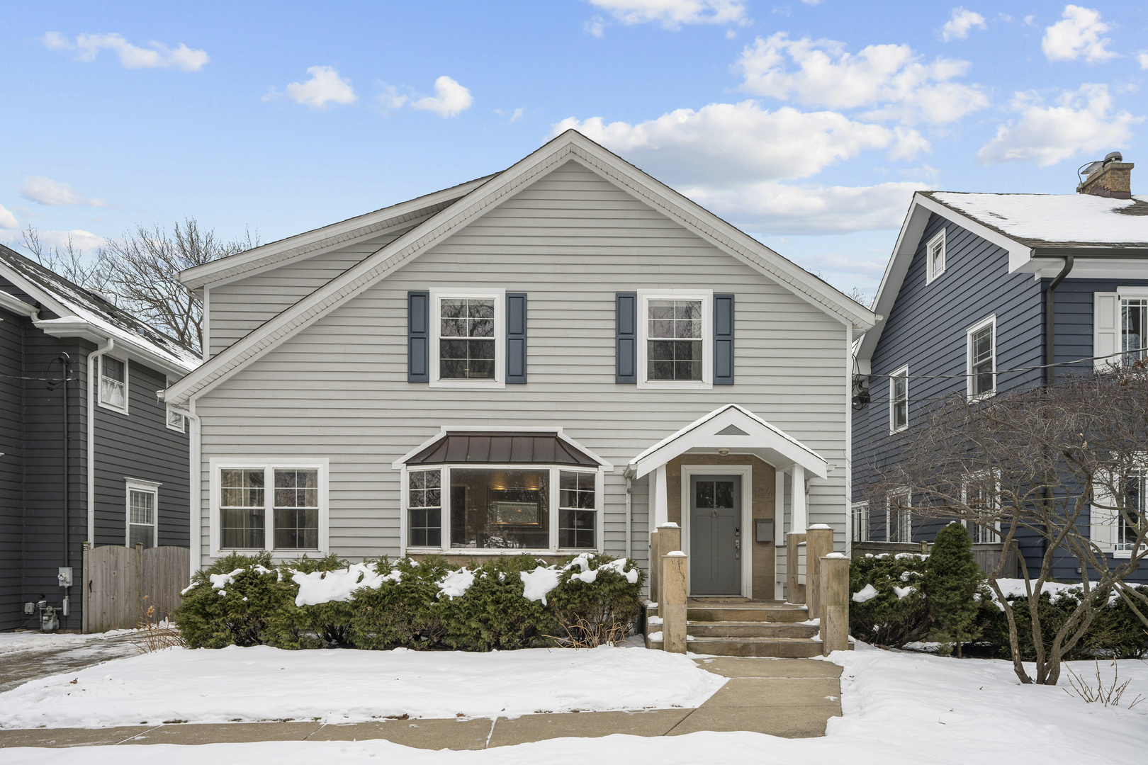 Welcome to this beautifully renovated home that combines modern finishes with timeless comfort, offering a truly move-in-ready feel. Thoughtfully redesigned for today's lifestyle, this exceptional five-bedroom residence features a spacious, light-filled open floor plan and extensive upgrades throughout. All major systems have been updated, including plumbing, electrical, roof, siding, and windows. Hardwood floors throughout the first and second floors. The inviting living room showcases a bay window and wood-burning fireplace, while the entertainment-sized dining room is ideal for hosting gatherings. Two main-level offices with custom built-ins provide perfect work-from-home spaces.  The chef's kitchen is the heart of the home, offering custom cabinetry with abundant storage, a large quartz island with bar seating and reverse-osmosis faucet, and an adjacent breakfast area with built-in banquette seating. High-end stainless-steel appliances include a Viking refrigerator/freezer, a 6-burner KitchenAid cooktop with hood, new KitchenAid built-in oven, microwave and warming drawer (2025), and KitchenAid dishwasher (2024). The butler's pantry, with second dishwasher (Miele 2025), adds both style and function. The kitchen opens seamlessly to the sun drenched, expansive family room featuring a gas fireplace, custom built-ins, recessed lighting and walls of windows. The family room leads out to the deep, fenced backyard with patio and outdoor kitchen--perfect for indoor-outdoor entertaining and family enjoyment. A powder room completes the first floor. The second floor offers a luxurious primary suite with spa-inspired bath, including a freestanding soaking tub, separate shower, double vanity, and marble countertops. Three additional bedrooms and two full baths, one a Jack-and-Jill, provide ample space for family. Convenient 2nd fl laundry room (LG washer/dryer - 2023).  The lower level is exceptionally well appointed, featuring a large recreation room with radiant heated floors and a bar/kitchen-like entertainment area.  Additional finished spaces include a playroom, den, 5th bedroom, and a full bath. Ideal for recreation, media, exercise or play, this level offers flexible options for extended family or multigenerational living. Detached 2-car garage provides ample parking and storage. Ideally located within walking distance to parks, schools, Metra, shops and restaurants, this special home truly has it all. Move right in!