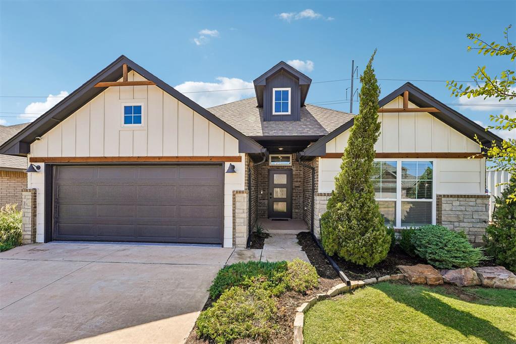 Builder's Model Home - Solar Panels Included - Sprinkler System Included - Storm Shelter Included - Full Fencing Included - Window Treatments Included - Year Round Climate Controlled Garage - Storm Door - Upgraded Lighting Package - Closing Costs Covered and so much more! You have got to see this beautiful home in the popular Deer Creek school district! This was a former model home that is now ready to sell! It is a fantastic open layout that makes the most of it's space. Warm wood tile flows throughout all the main areas of the home, seamlessly tying the spaces together. The stunning wood and tile fireplace is a centerpiece in the living room. The kitchen is loaded with custom cabinets, thick quartz tops, undercabinet lighting, a large island with farm sink, stainless steel built-in Samsung appliances, a wonderful decorative wood vented hood, five burner gas cook top and much more! The primary bedroom is very large and the en suite bathroom features a roomy soaker tub and tiled shower. The primary closet has a third row perfect for storing different seasons of clothes, and enters into the utility room for easy convenience. The spare bedrooms are very spacious as well. Beautiful 2" faux wood blinds installed throughout the home. The garage comes with a storm shelter, insulated garage door, garage door opener and a mini split heat and ac unit. This home is also fitted out with solar panels so you can save a bundle on your energy bills! Sprinkler system and lush landscaping make the outside of this home a stand out! Come take advantage of this chance today!
