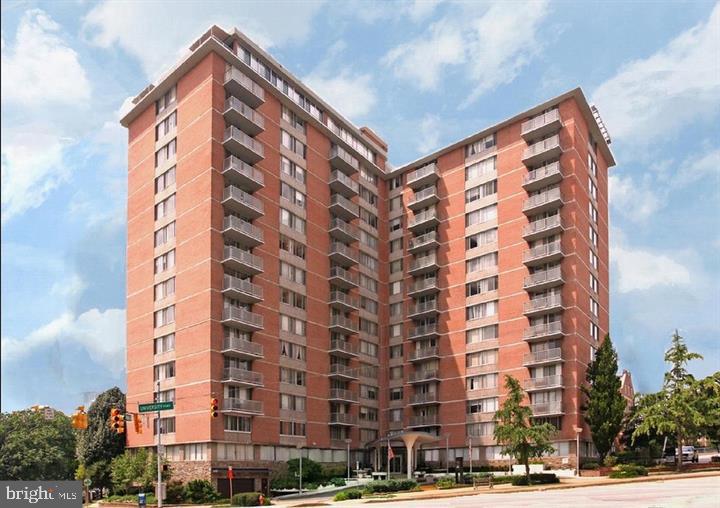 This charming studio unit is available for lease beginning October 11, 2025 and features updated kitchen and bath along with balcony with great views of Guilford Park. Newer carpet and freshly painted. Walking distance from JHU Homewood Campus. Pool, exercise room.  Rent includes: water, gas, electricity, HOA, heating, and AC! Onsite front desk support. The building has a roof-top swimming pool, and ground level community room with big-screen TV and full service kitchen that residents can rent for private parties and gatherings. On-site laundry is available. On-site, garage parking is available as well for a fee.You can easily jump on the free Shuttle Buses that stop just outside the door to site see Charm city. Check out the south view of Charles Village and the Johns Hopkins’ Campus. The Charles Village Shopping Center is just a block away with Barnes and Noble, Starbucks, Chipotle, and other name retailers. Other features include Zip Car rentals just across the street.